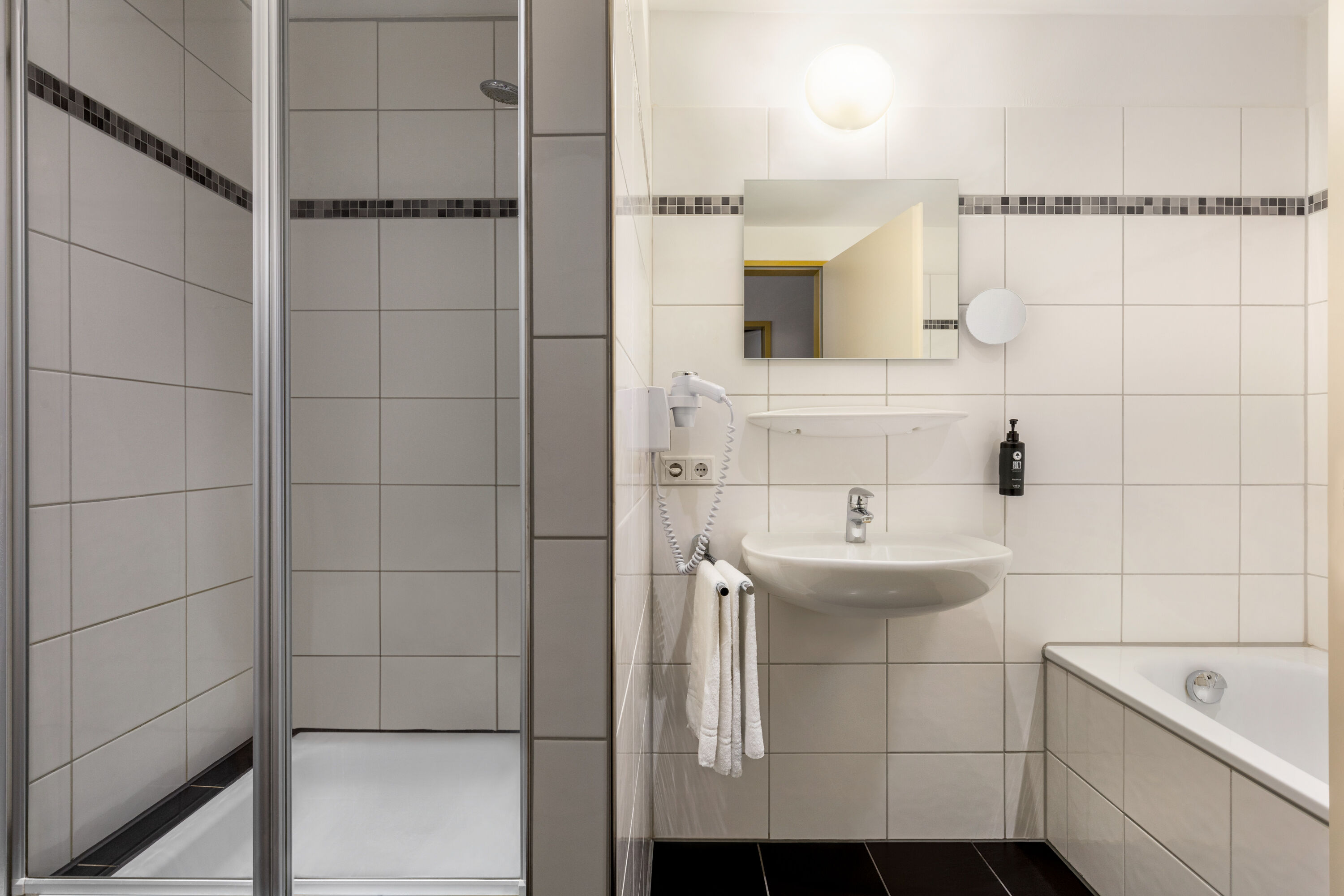 Guest room bath at the Amedia Express Bielefeld, Trademark Collection by Wyndham in Werther, Other than US/Canada