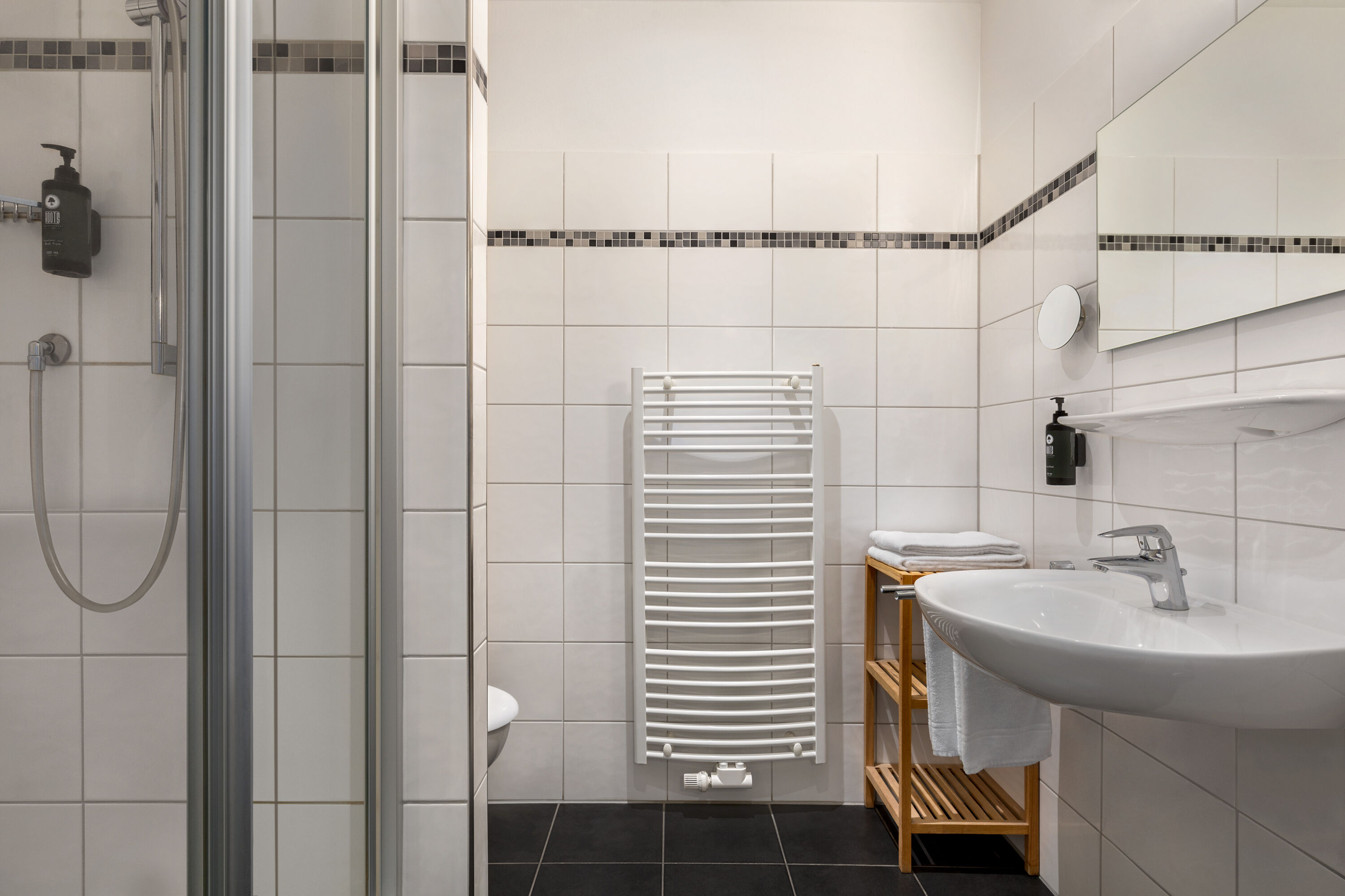 Guest room bath at the Amedia Express Bielefeld, Trademark Collection by Wyndham in Werther, Other than US/Canada
