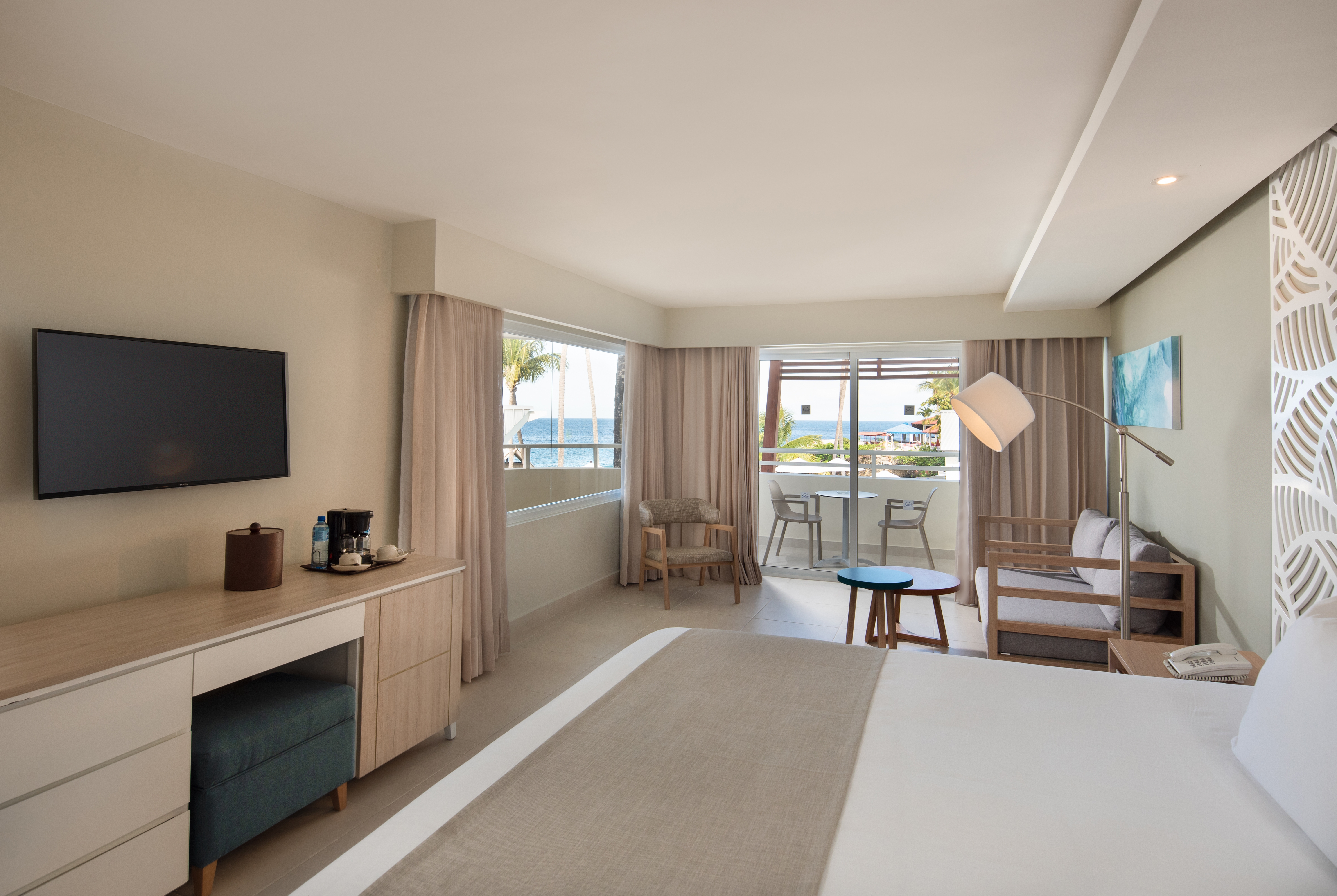 King bed guest room at the Select Sosua Adults Only, Trademark by Wyndham All Inclusive in Sosua, Other than US/Canada