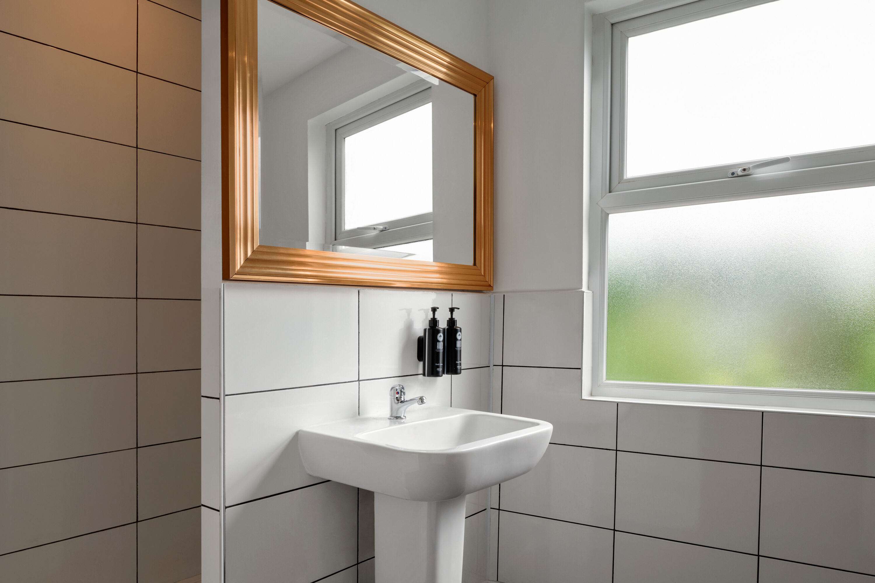 Guest room bath at the Trafford Hall Manchester, Trademark Collection by Wyndham in Manchester, Other than US/Canada