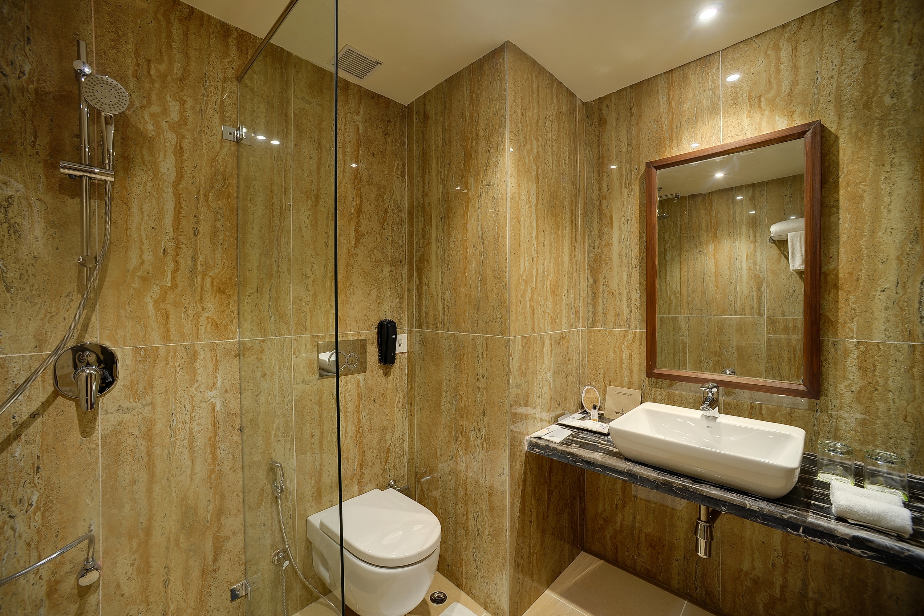 Guest room bath at the Cygnett Park Meghna Trademark by Wyndham in Bongaigaon, Other than US/Canada