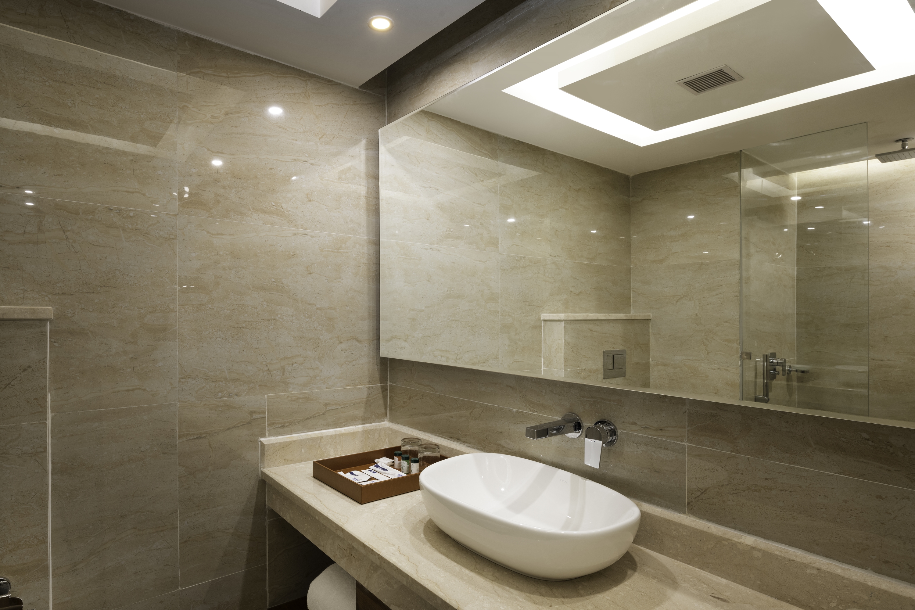 Guest room bath at the Cygnett Inn Paras Trademark by Wyndham in Dehradun, Other than US/Canada