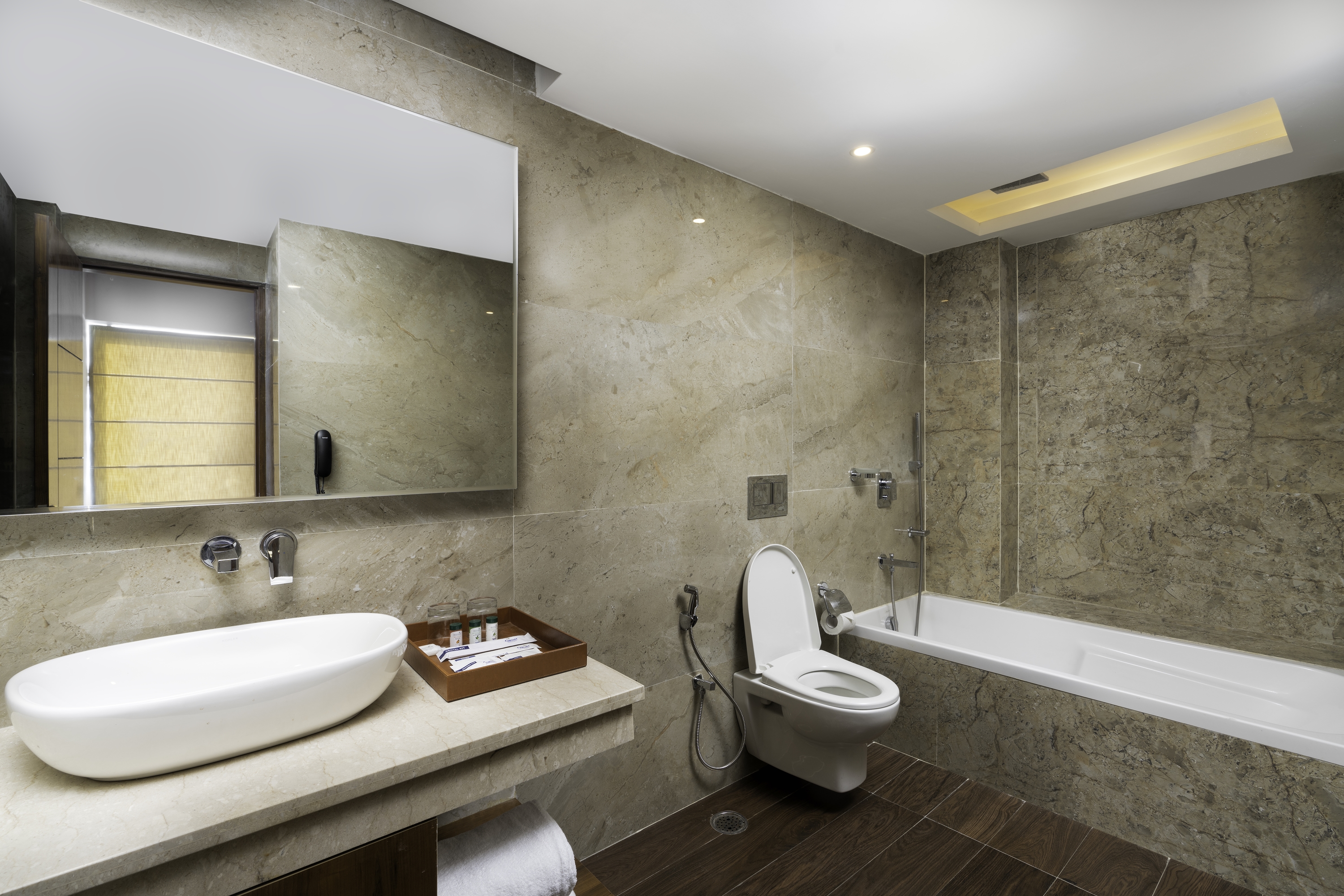 Guest room bath at the Cygnett Inn Paras Trademark by Wyndham in Dehradun, Other than US/Canada