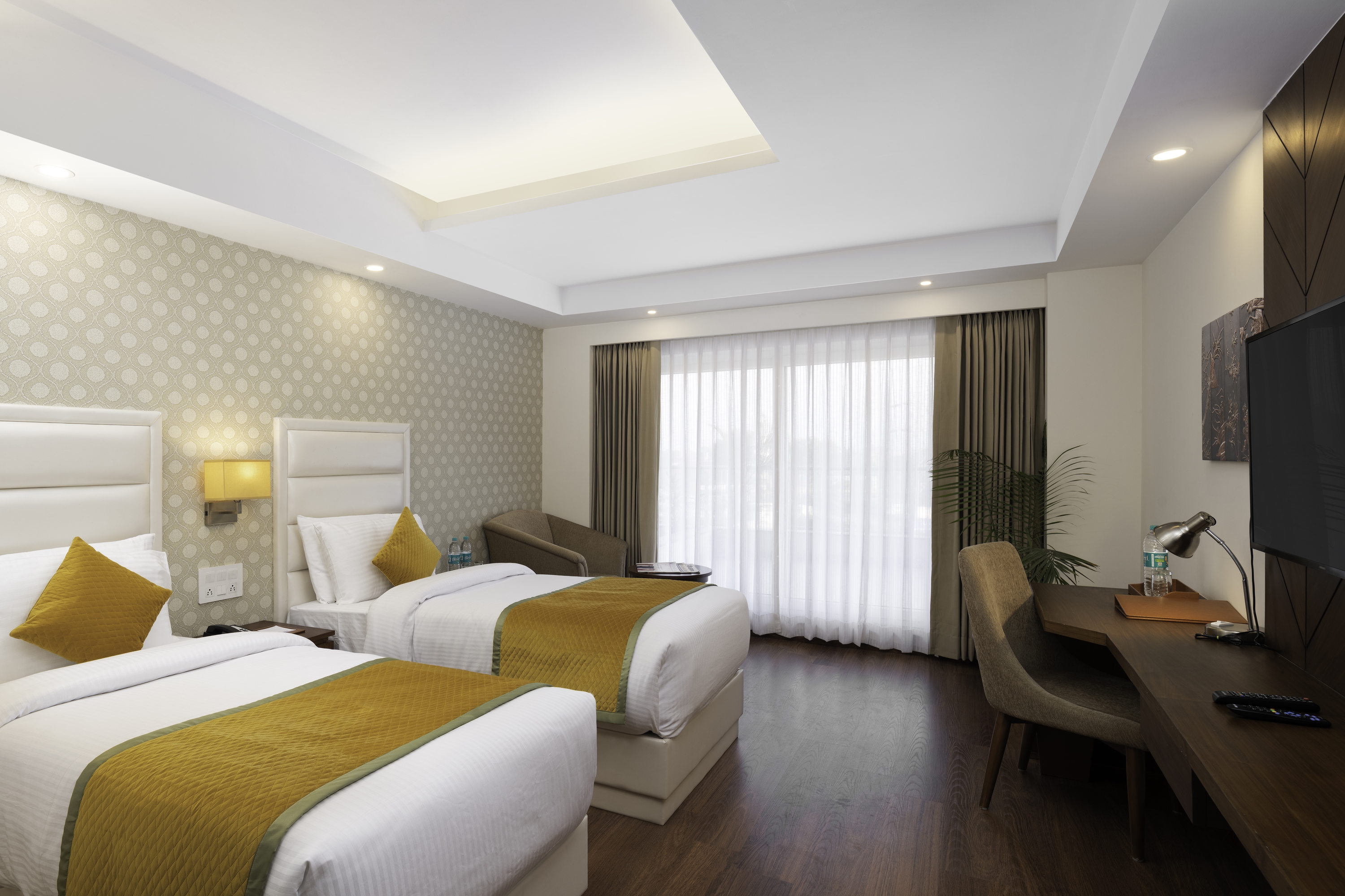 Guest room at the Cygnett Inn Paras Trademark by Wyndham in Dehradun, Other than US/Canada