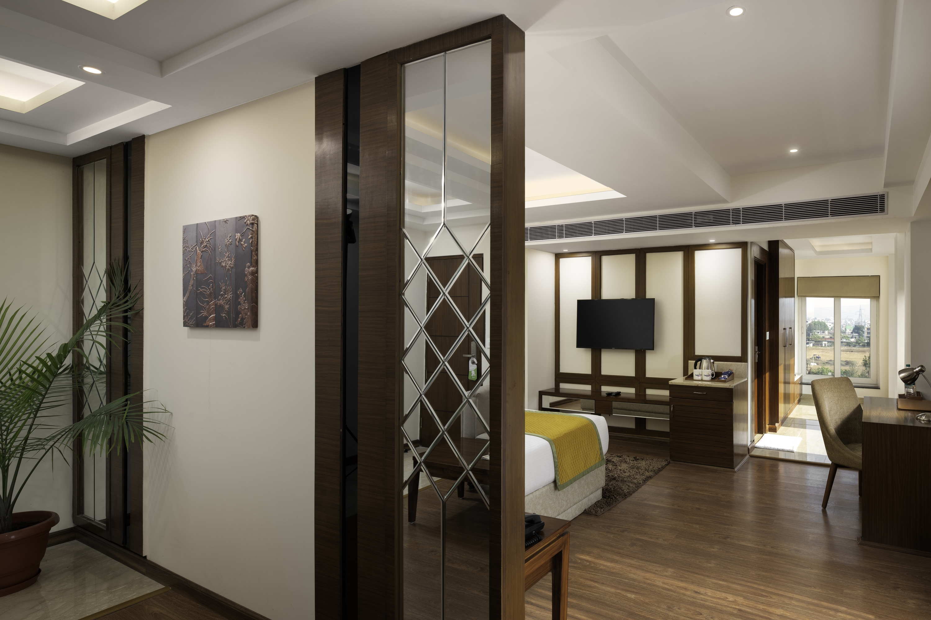 Guest room at the Cygnett Inn Paras Trademark by Wyndham in Dehradun, Other than US/Canada