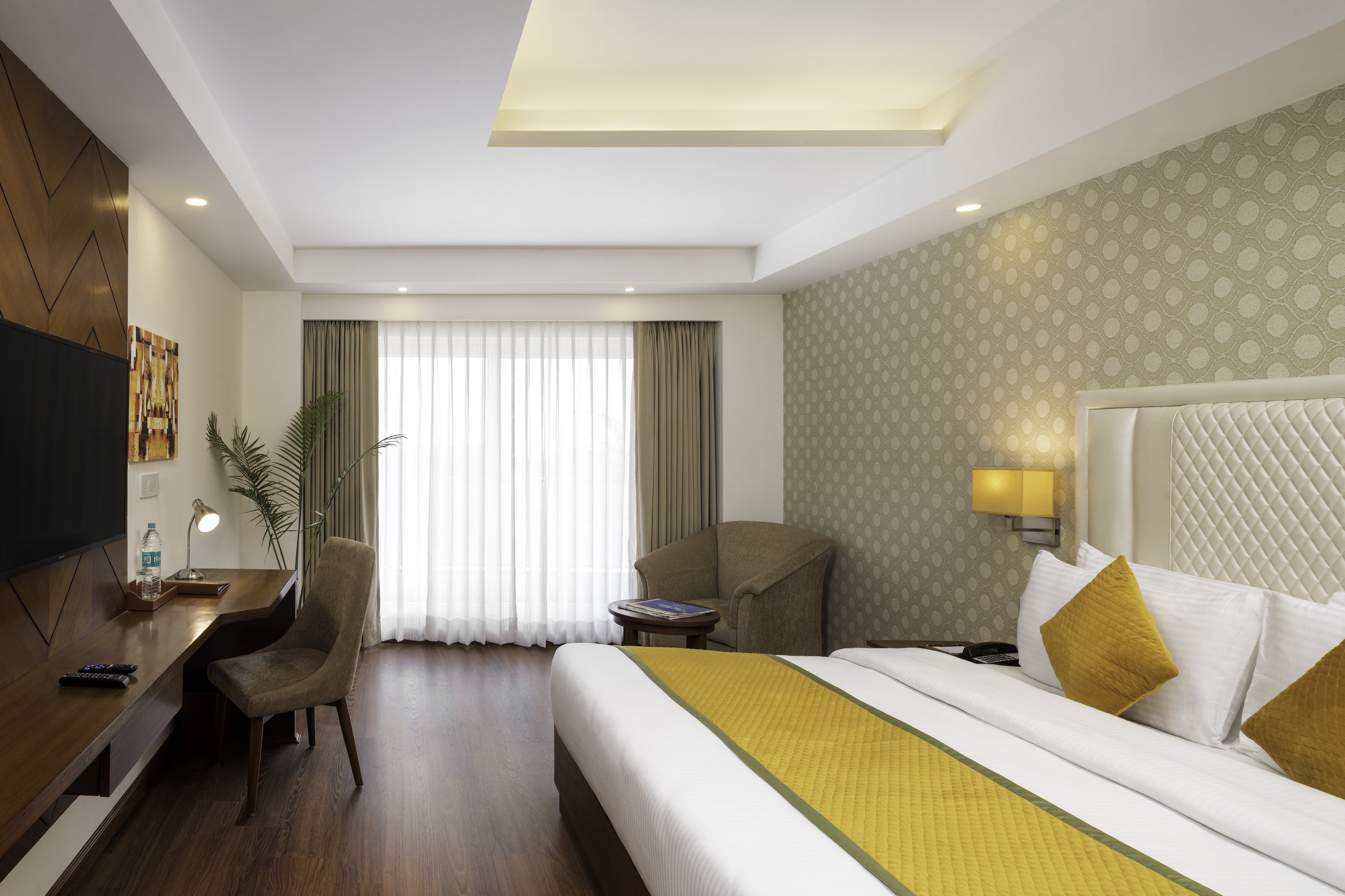 Guest room at the Cygnett Inn Paras Trademark by Wyndham in Dehradun, Other than US/Canada