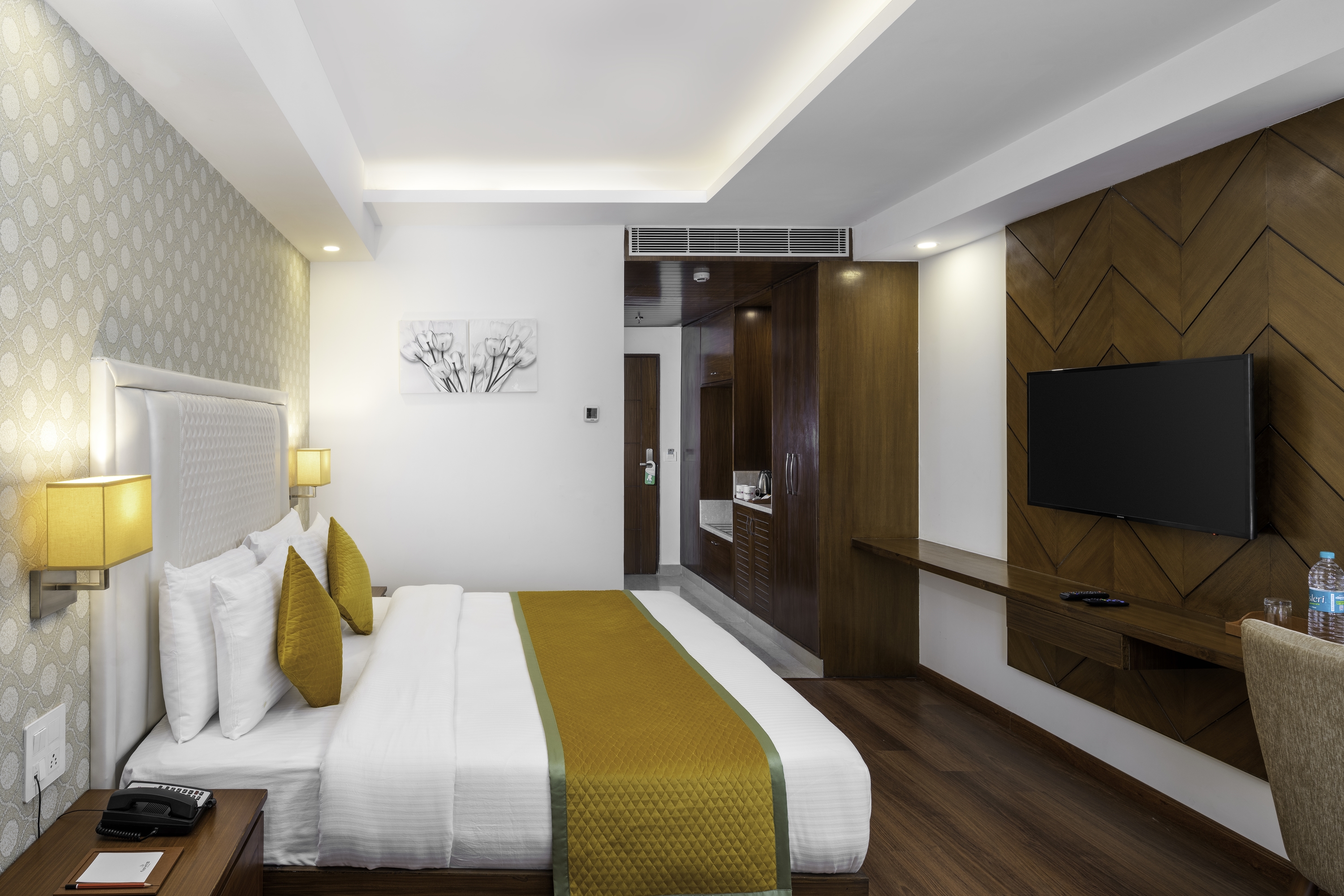 Guest room at the Cygnett Inn Paras Trademark by Wyndham in Dehradun, Other than US/Canada