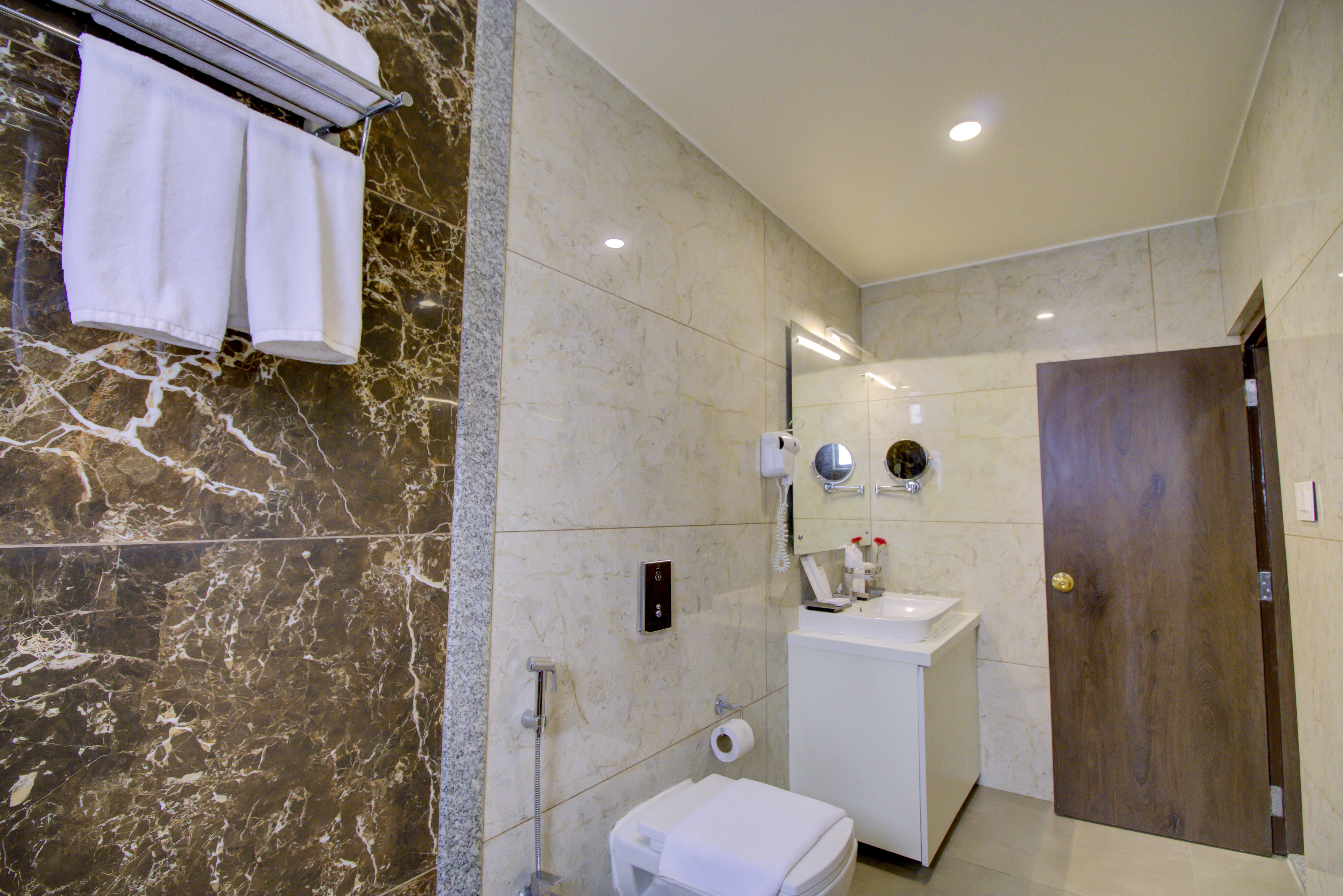 Guest room bath at the Cygnett Inn Trendz Trademark by Wyndham in Itanagar, Other than US/Canada