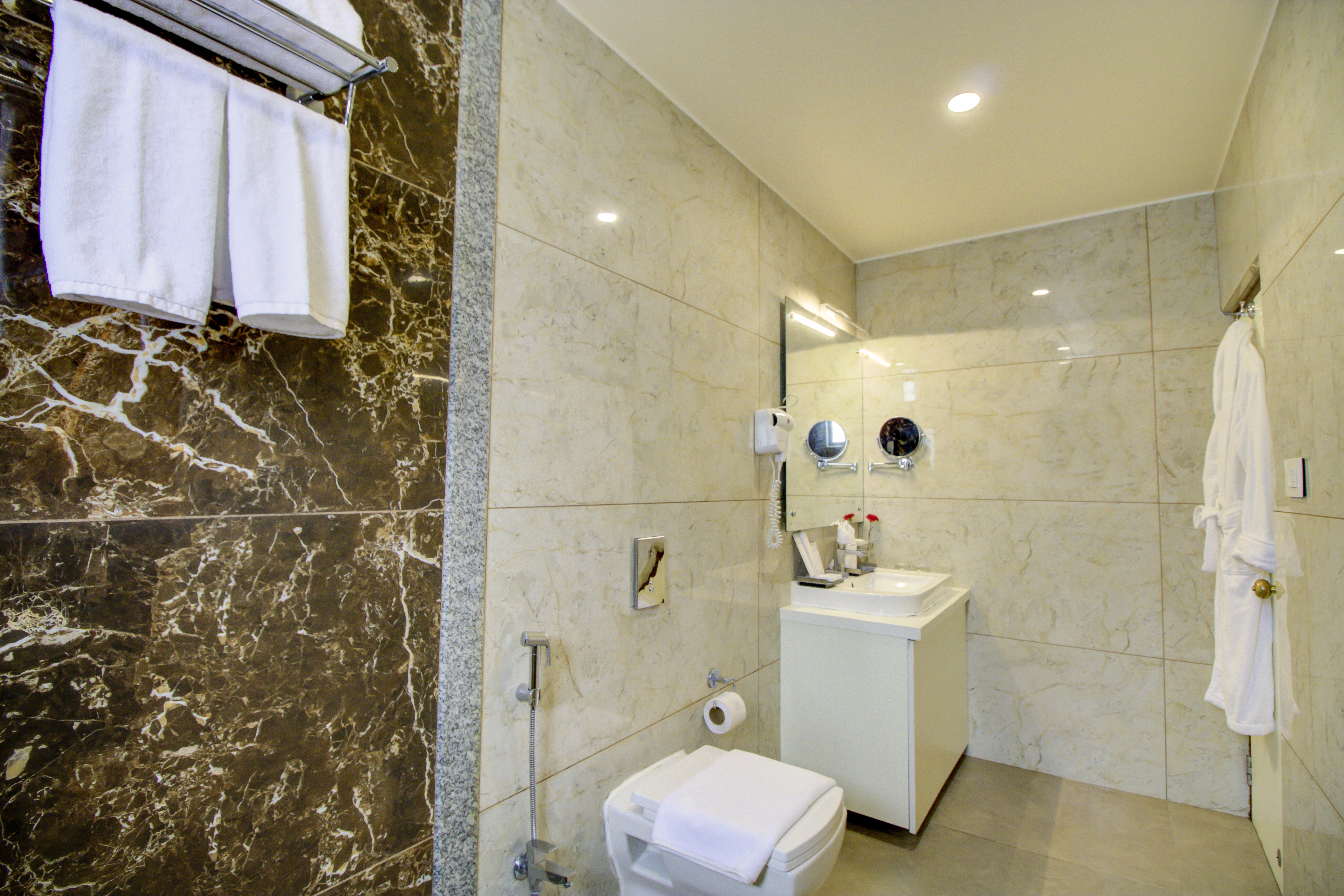 Guest room bath at the Cygnett Inn Trendz Trademark by Wyndham in Itanagar, Other than US/Canada