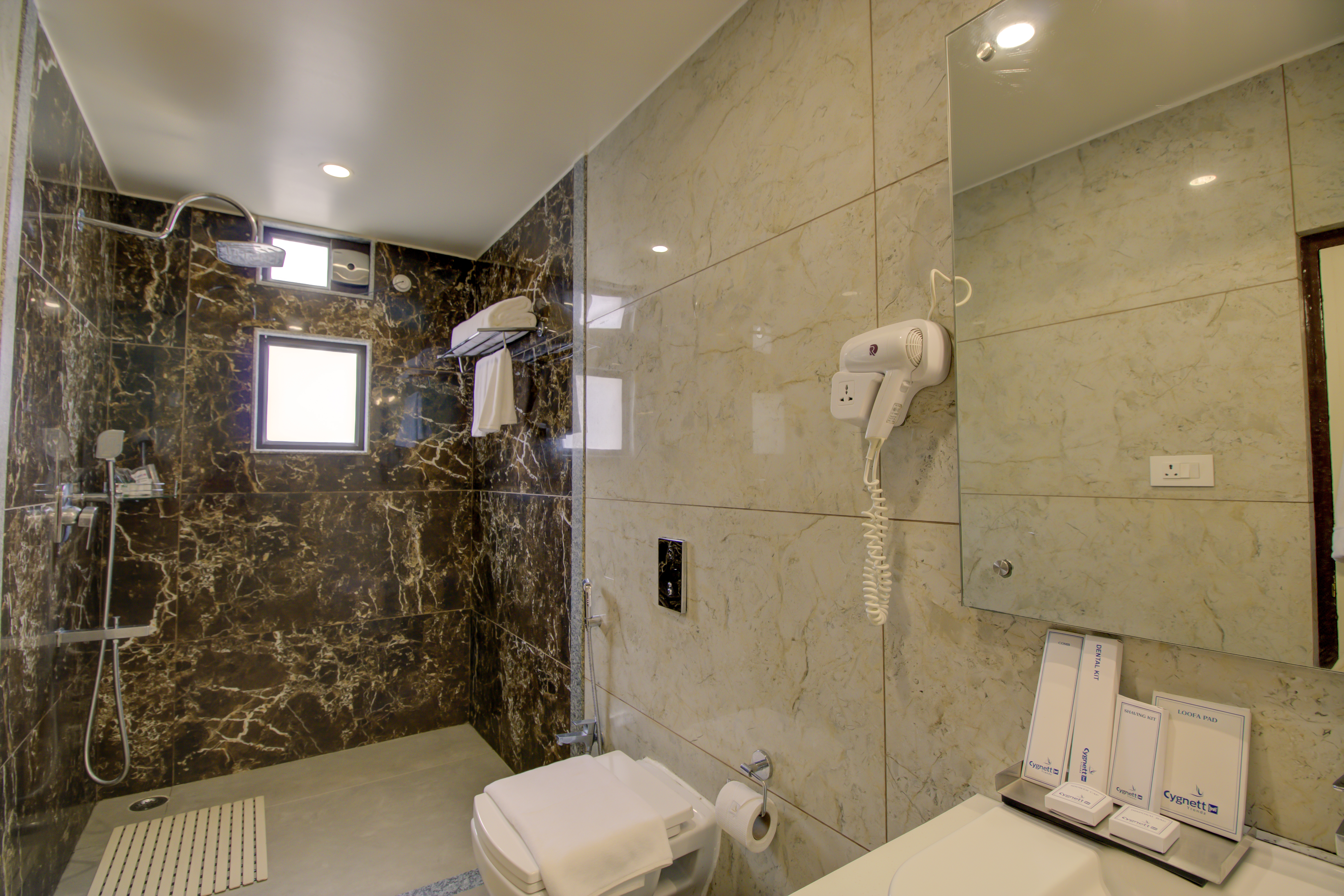 Guest room bath at the Cygnett Inn Trendz Trademark by Wyndham in Itanagar, Other than US/Canada