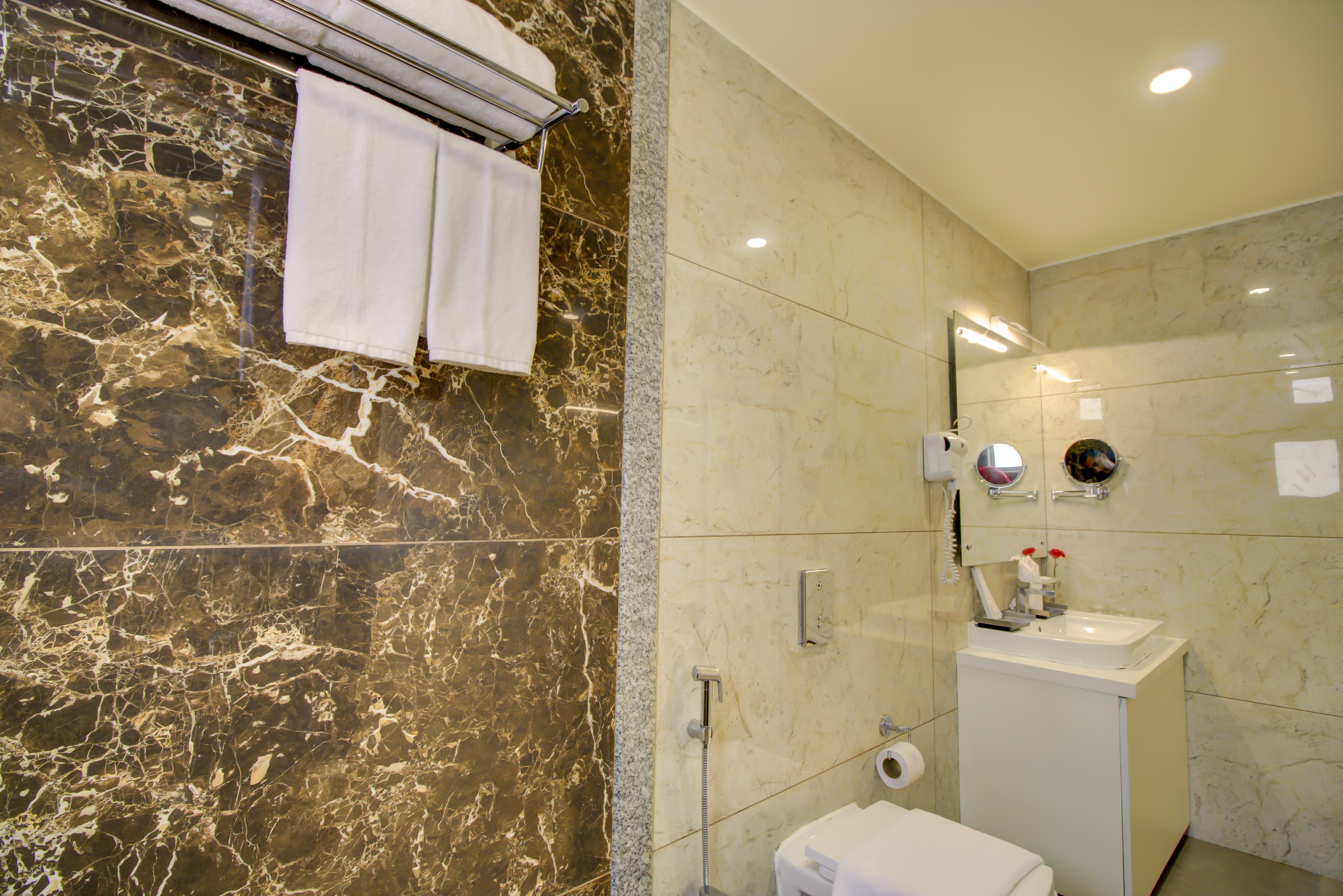 Guest room bath at the Cygnett Inn Trendz Trademark by Wyndham in Itanagar, Other than US/Canada