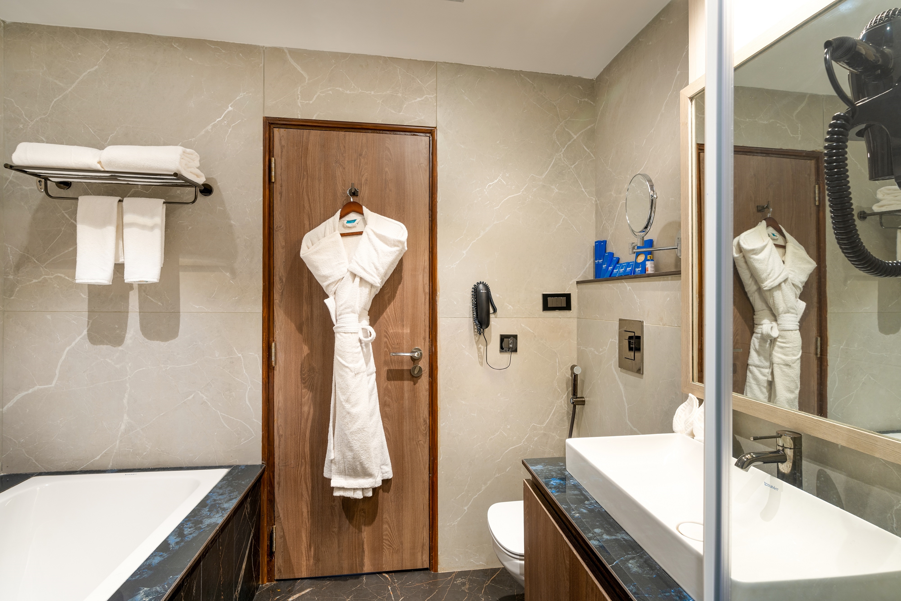 Guest room bath at the Cygnett Inn Imperial Trademark by Wyndham in Tezpur, Other than US/Canada