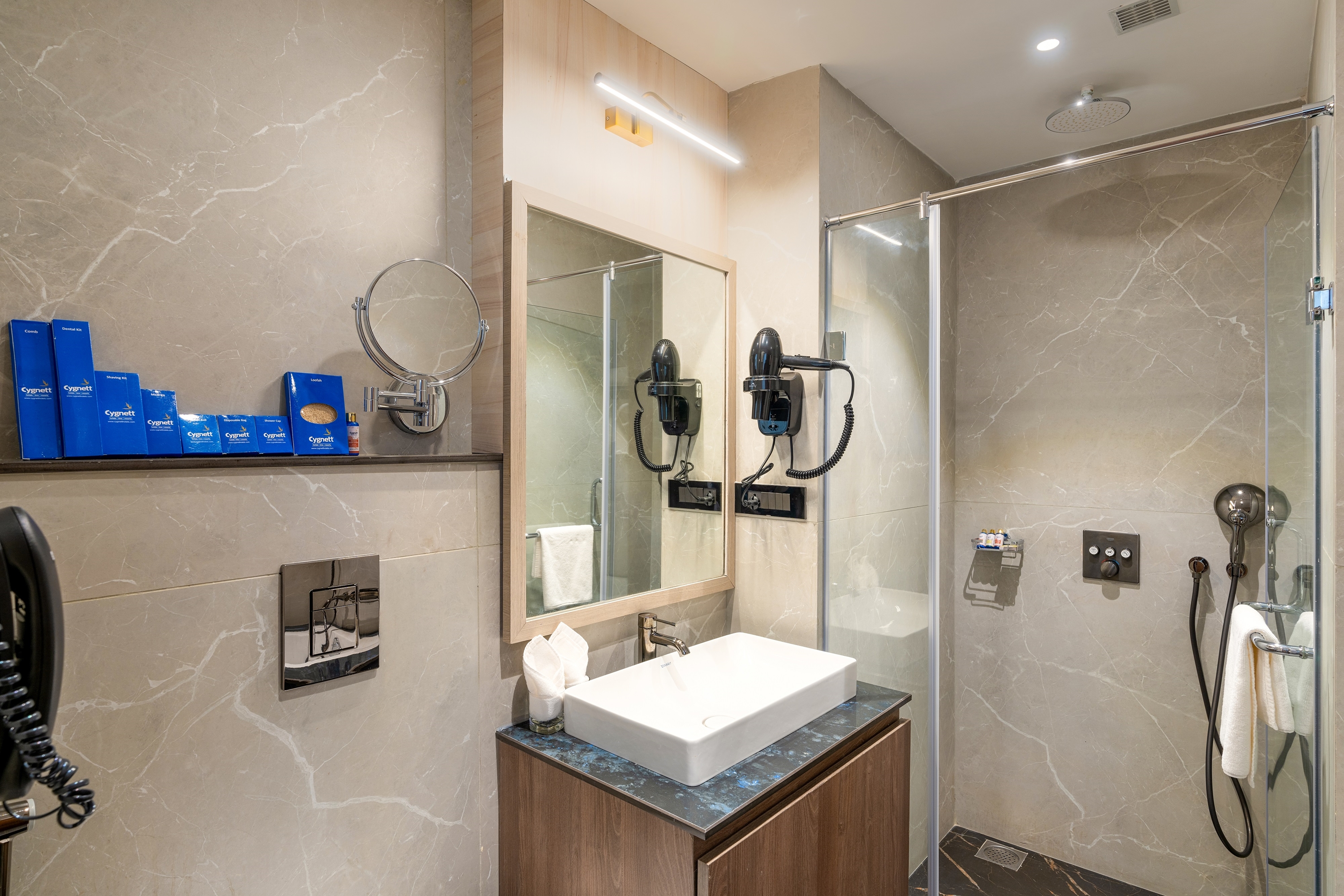 Guest room bath at the Cygnett Inn Imperial Trademark by Wyndham in Tezpur, Other than US/Canada