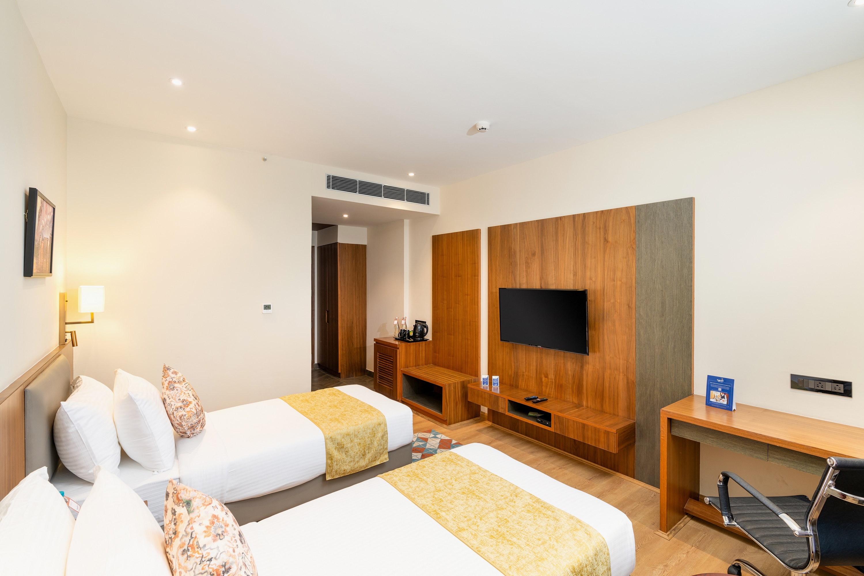 Guest room at the Cygnett Inn Imperial Trademark by Wyndham in Tezpur, Other than US/Canada