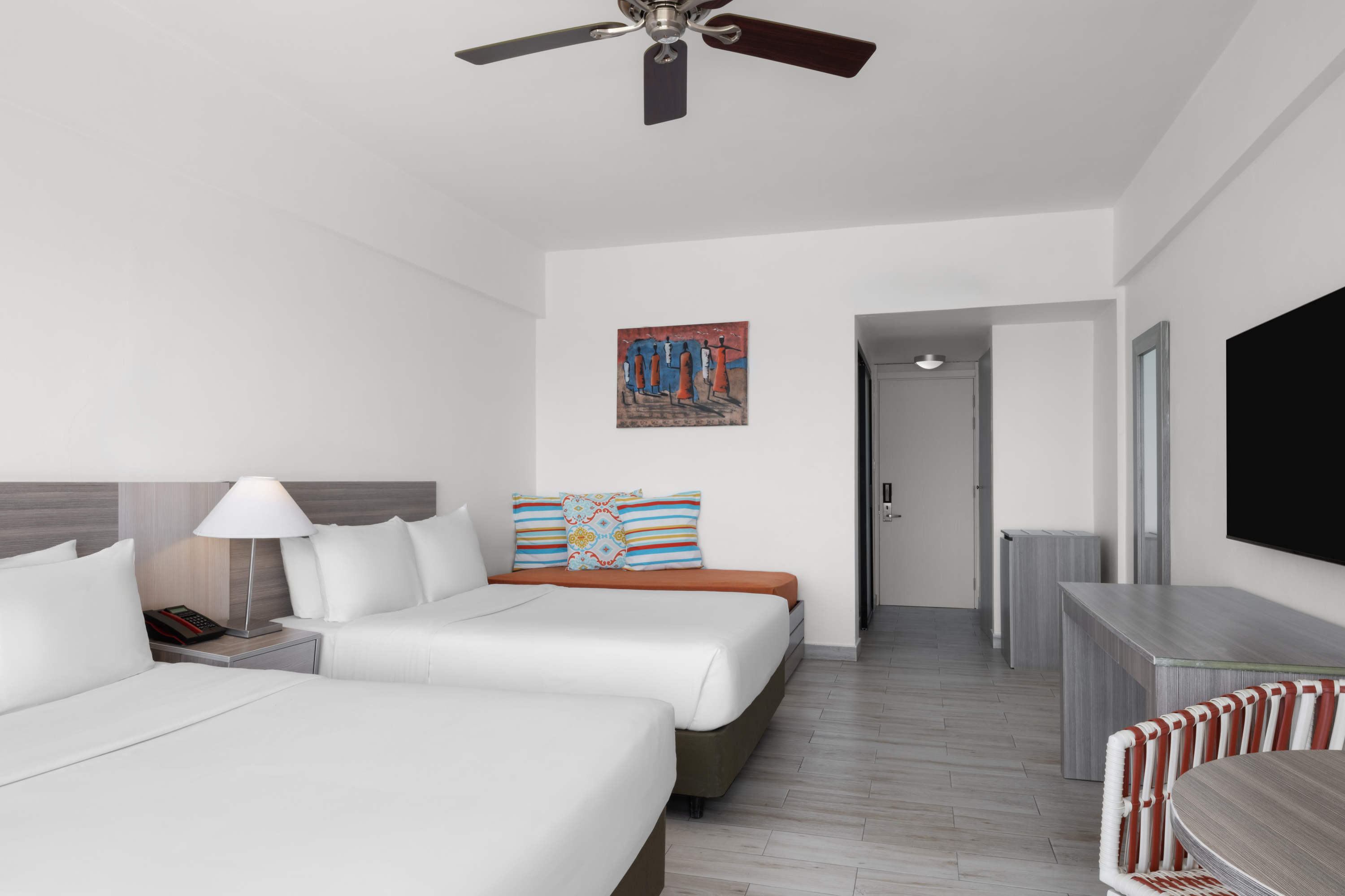 Guest room at the Grand Decameron Cornwall Beach, A Trademark All Inclusive in Montego Bay, Other than US/Canada