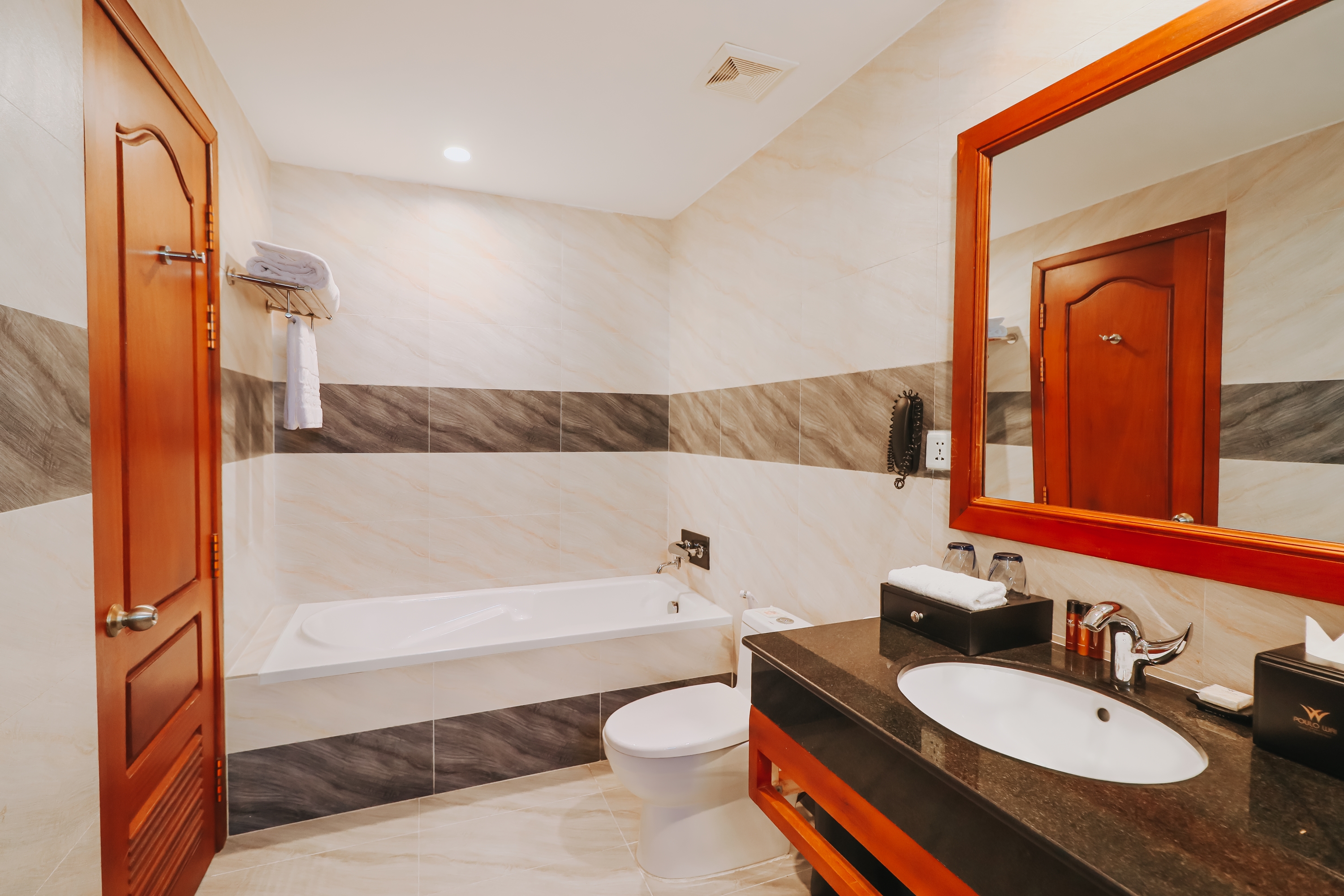 Guest room bath at the Poulo Wai Hotel, Trademark Collection by Wyndham in Phnom Penh, Other than US/Canada