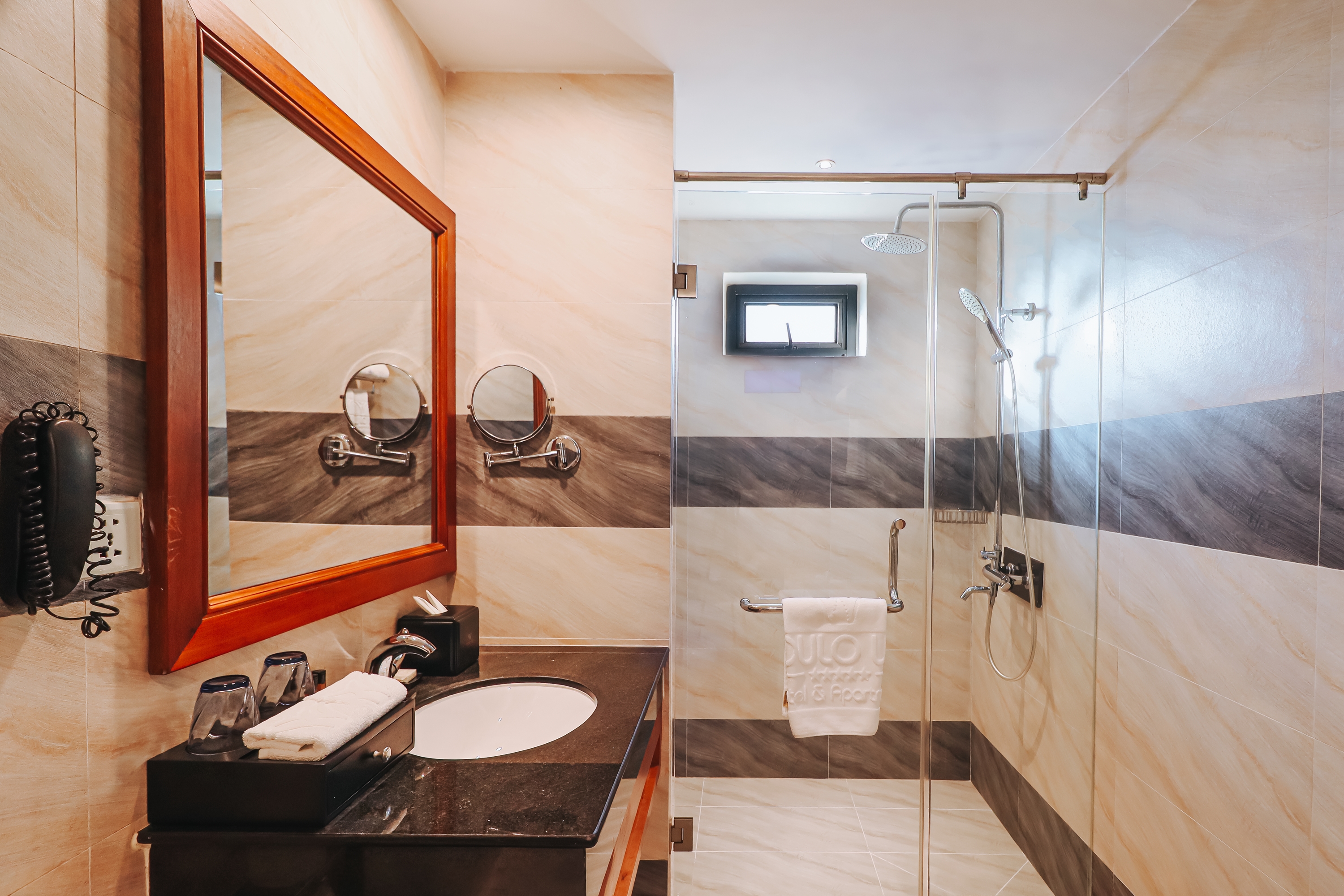 Guest room bath at the Poulo Wai Hotel, Trademark Collection by Wyndham in Phnom Penh, Other than US/Canada