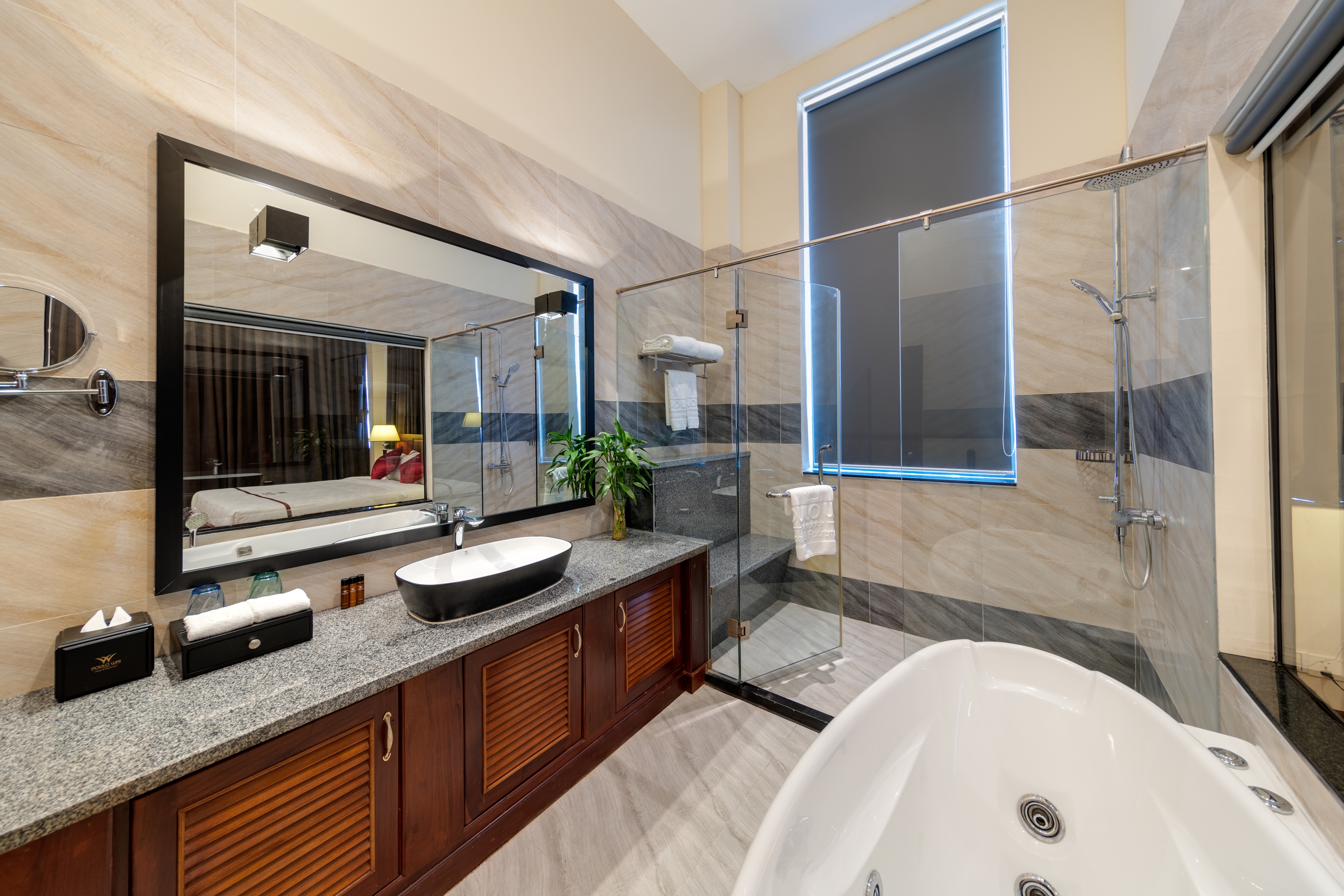 Guest room bath at the Poulo Wai Hotel, Trademark Collection by Wyndham in Phnom Penh, Other than US/Canada