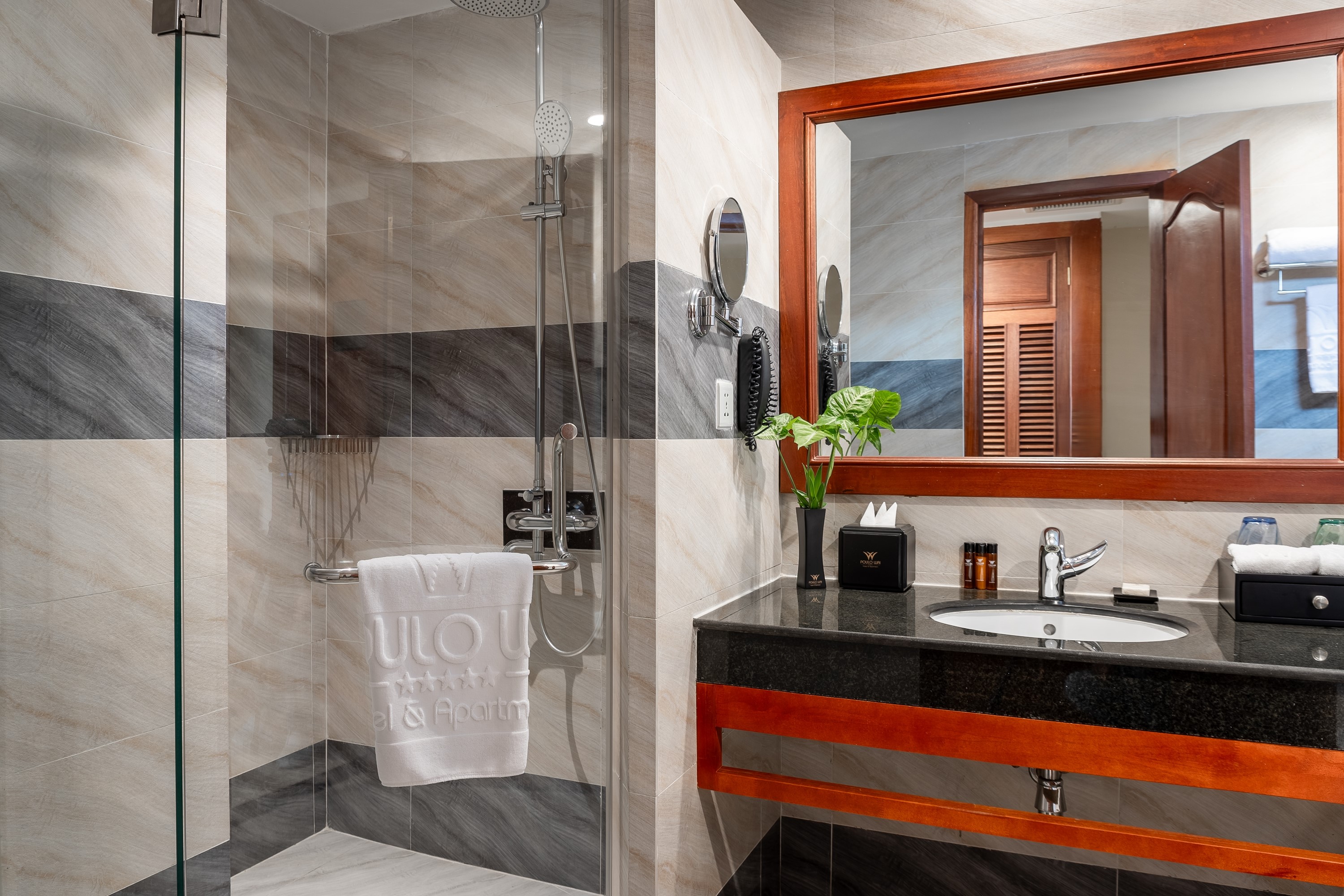 Guest room bath at the Poulo Wai Hotel, Trademark Collection by Wyndham in Phnom Penh, Other than US/Canada