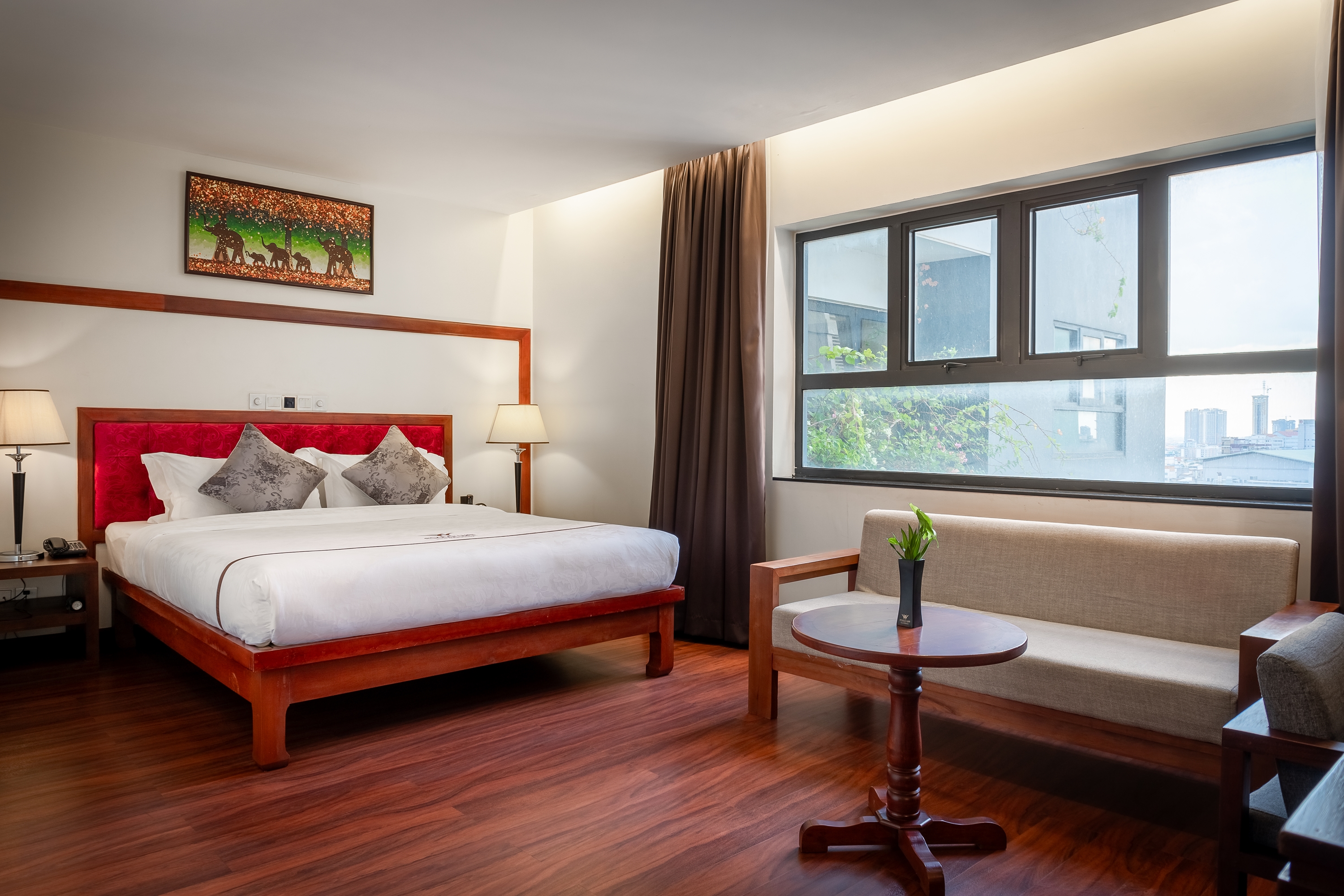 Guest room at the Poulo Wai Hotel, Trademark Collection by Wyndham in Phnom Penh, Other than US/Canada