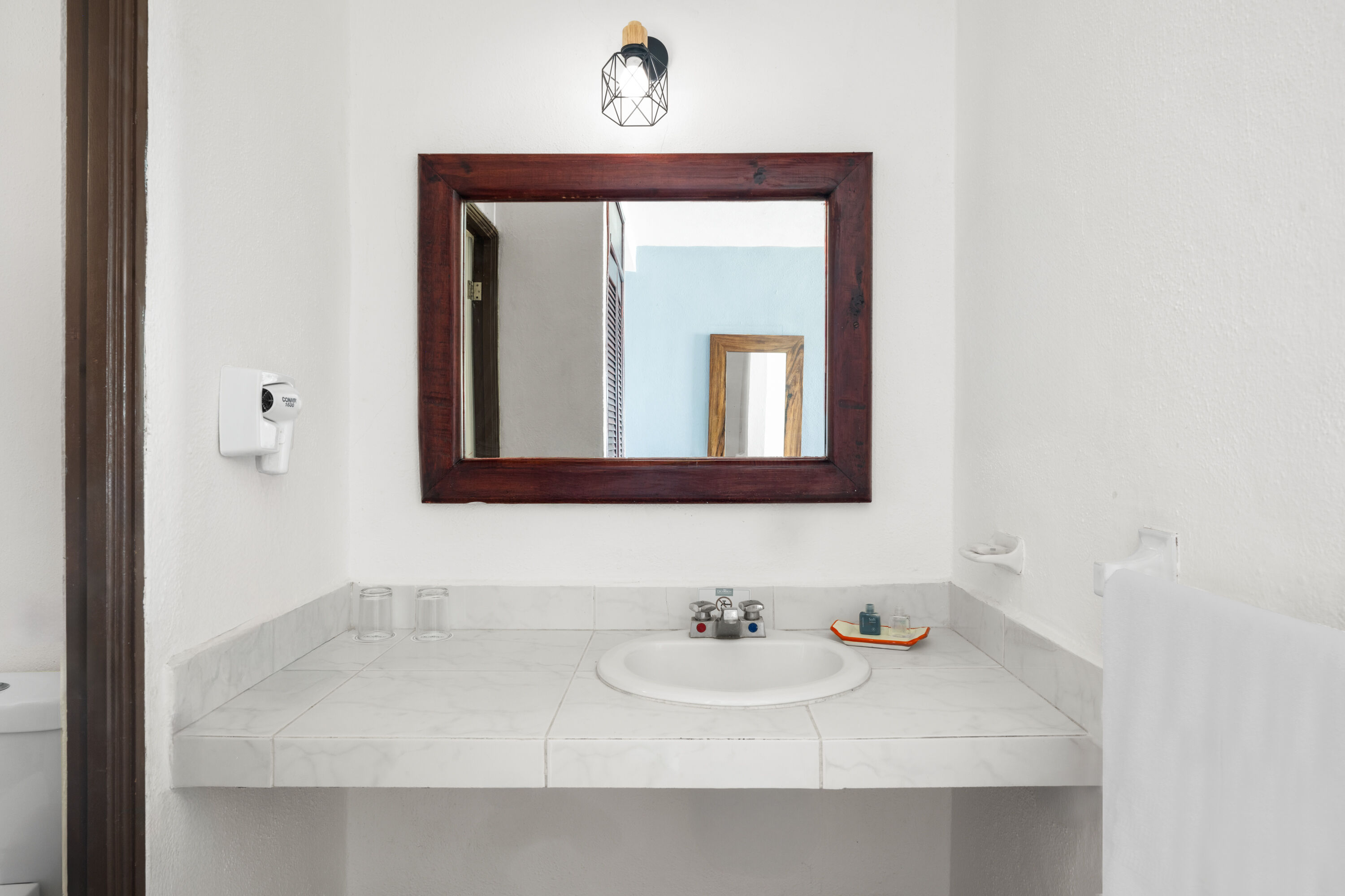 Guest room bath at the Grand Decameron Complex Bucerias, A Trademark All Inclusive in Bucerias, Other than US/Canada