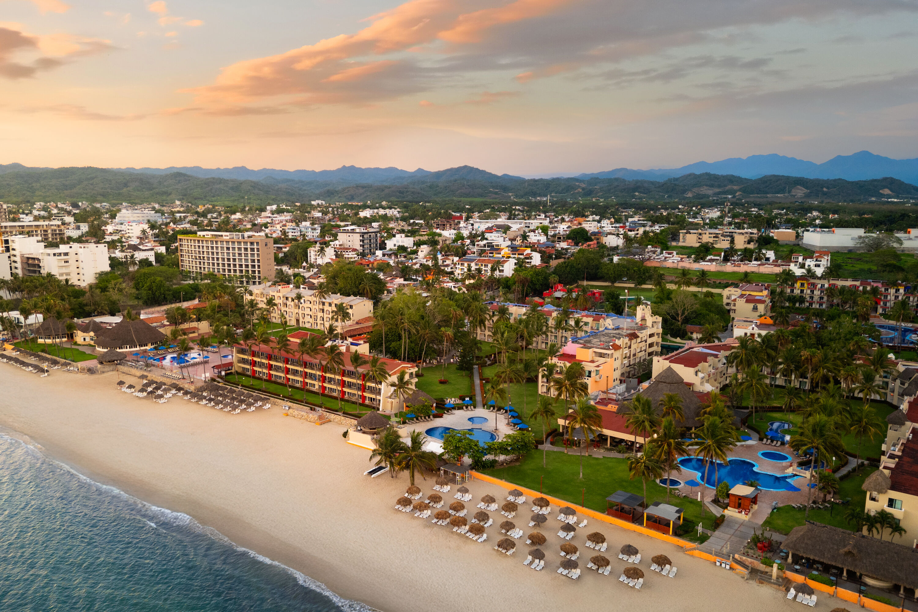 Exterior Dusk Image of Grand Decameron Complex Bucerias, A Trademark All Inclusive hotel in Bucerias, Other than US/Canada