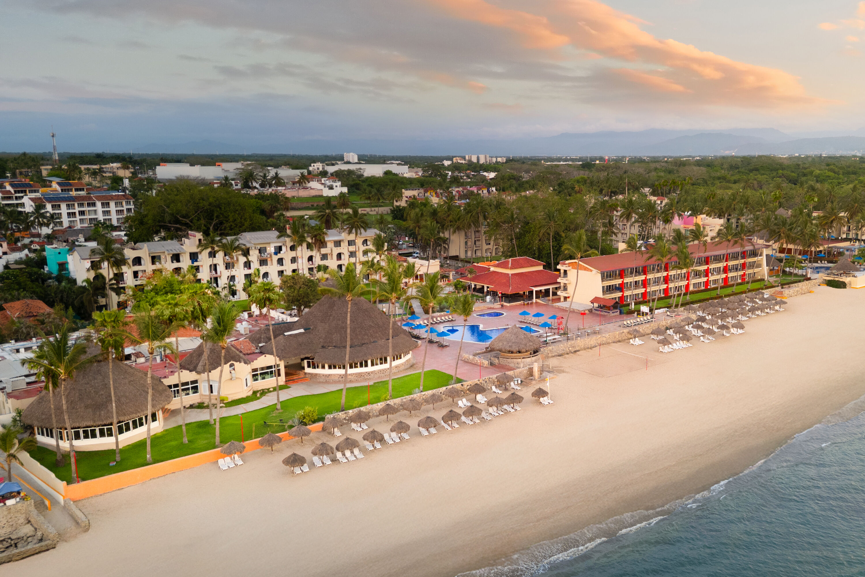 Exterior Dusk Image of Grand Decameron Complex Bucerias, A Trademark All Inclusive hotel in Bucerias, Other than US/Canada