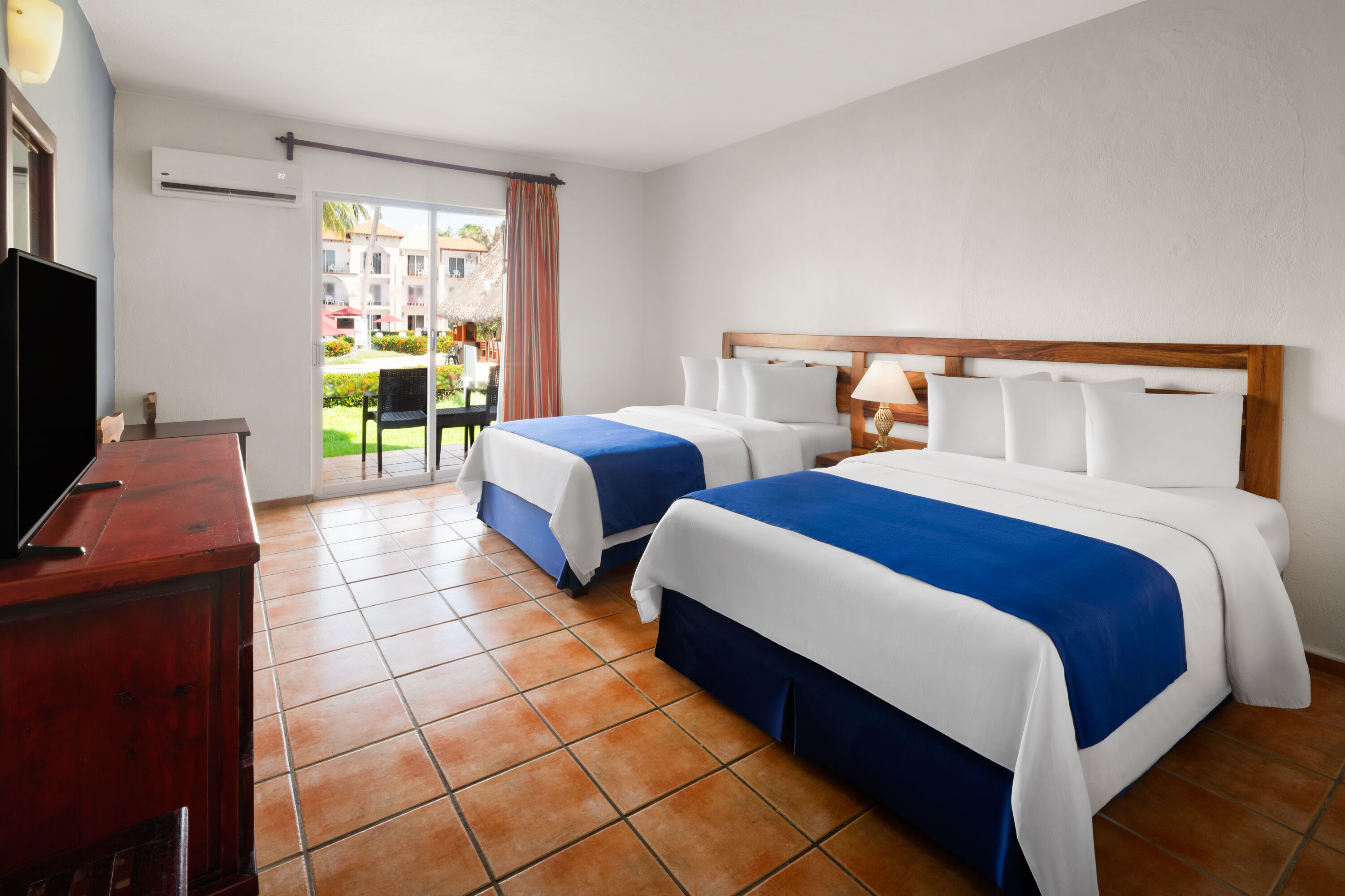 Guest room at the Grand Decameron Complex Bucerias, A Trademark All Inclusive in Bucerias, Other than US/Canada