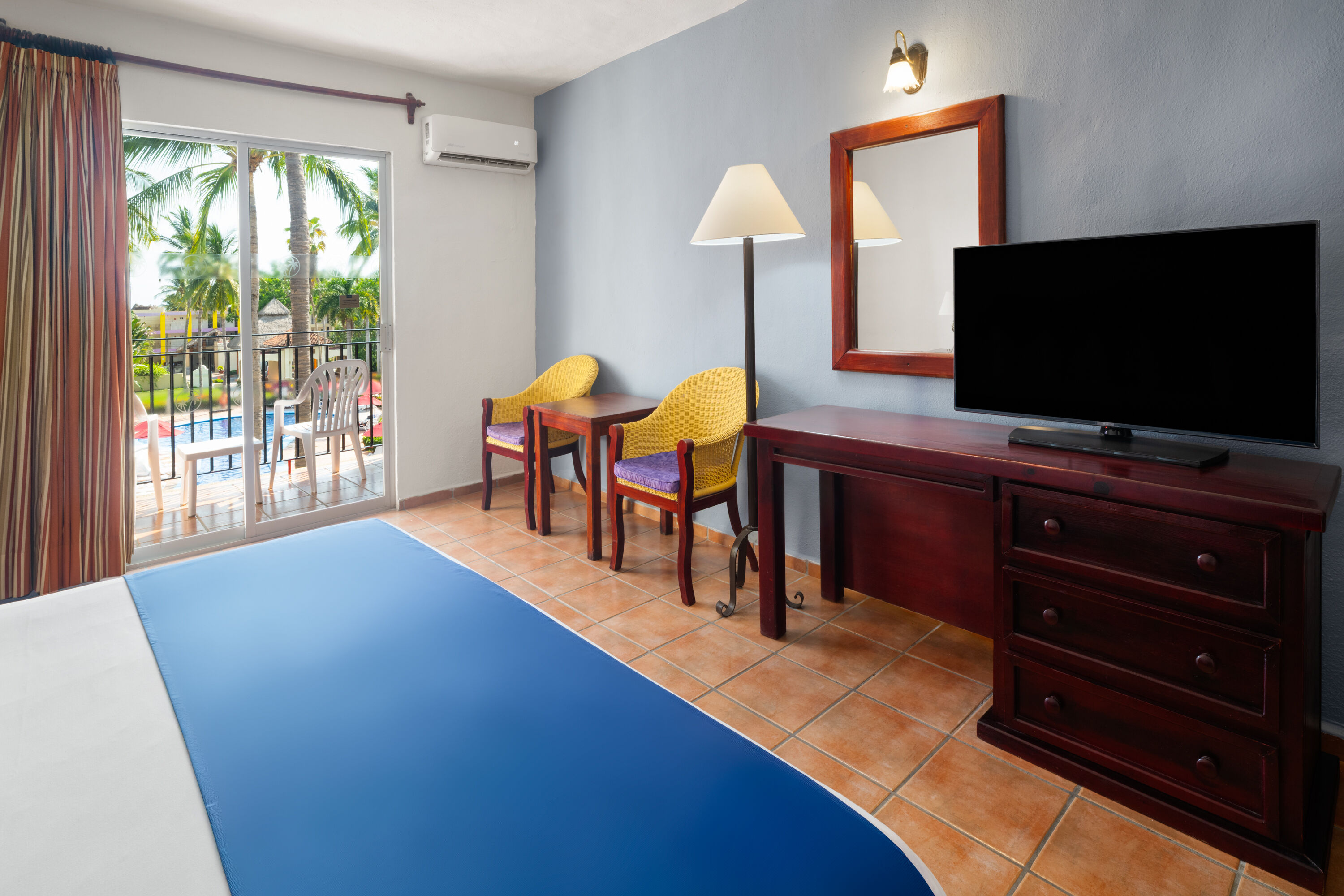 Guest room at the Grand Decameron Complex Bucerias, A Trademark All Inclusive in Bucerias, Other than US/Canada