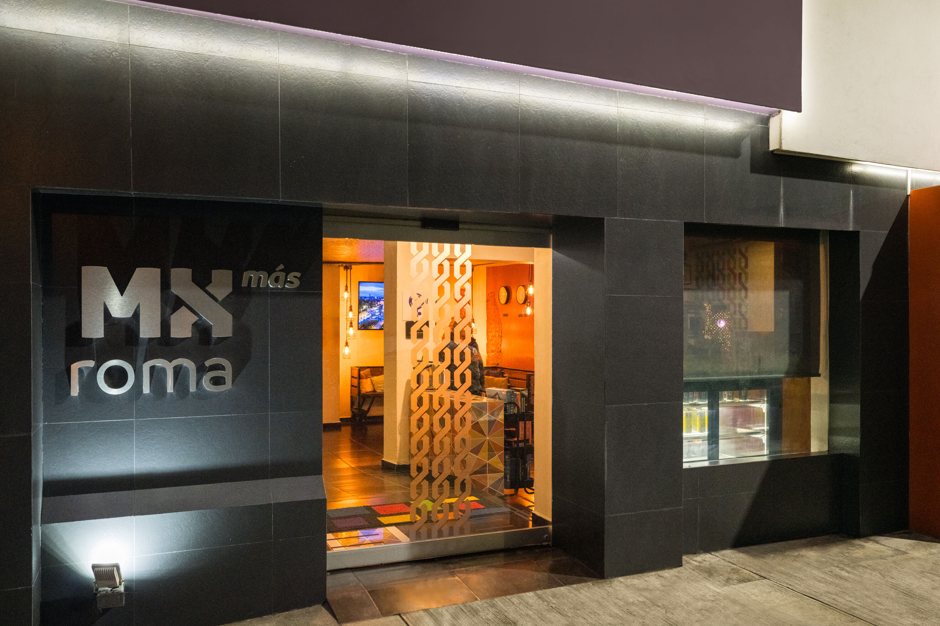 Exterior Dusk Image of Hotel MX mas roma CDMX, Trademark Collection by Wyndham hotel in Mexico City, Other than US/Canada