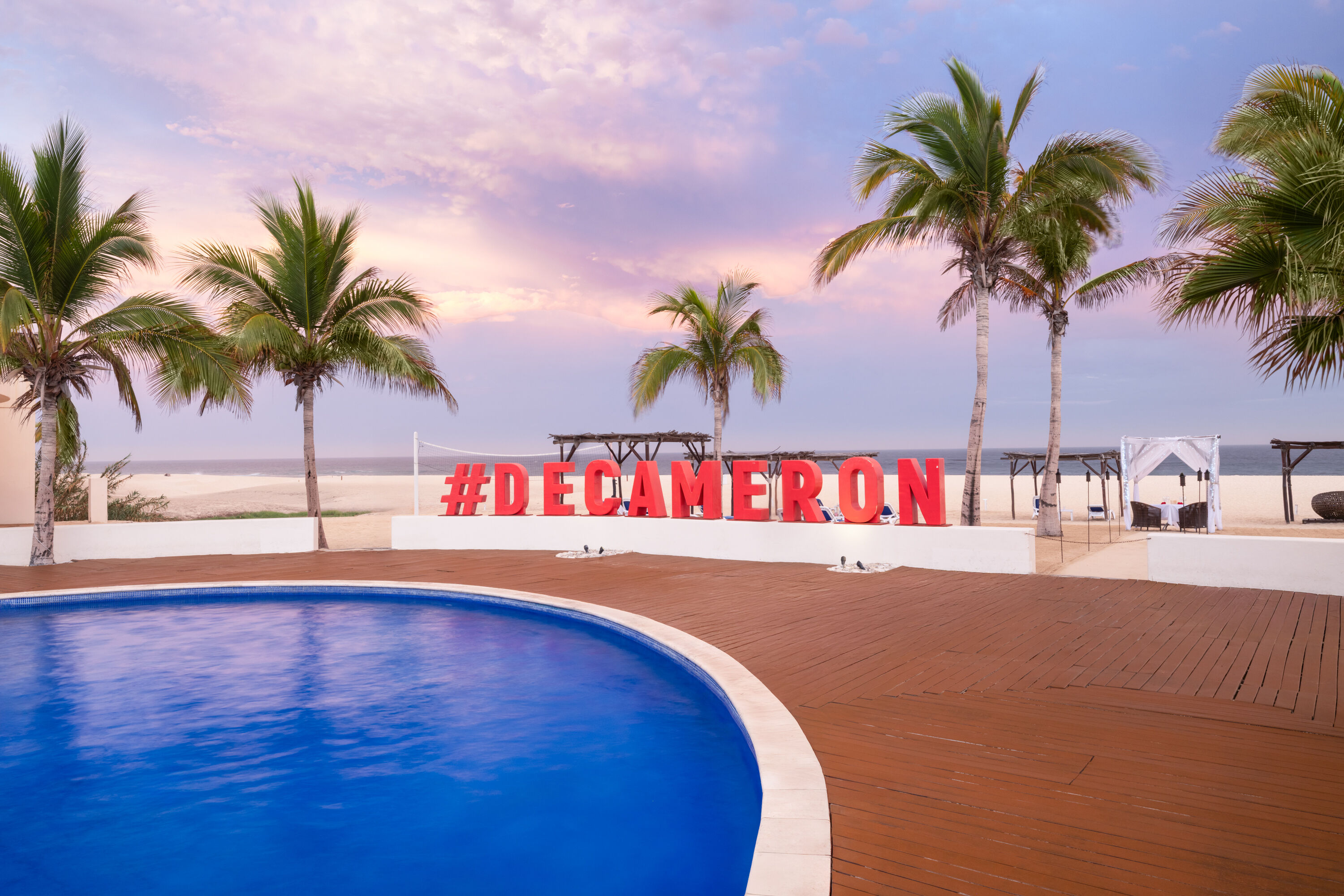 Pool night image at the Grand Decameron Los Cabos, A Trademark All Inclusive Resort in San Jose del Cabo, Other than US/Canada