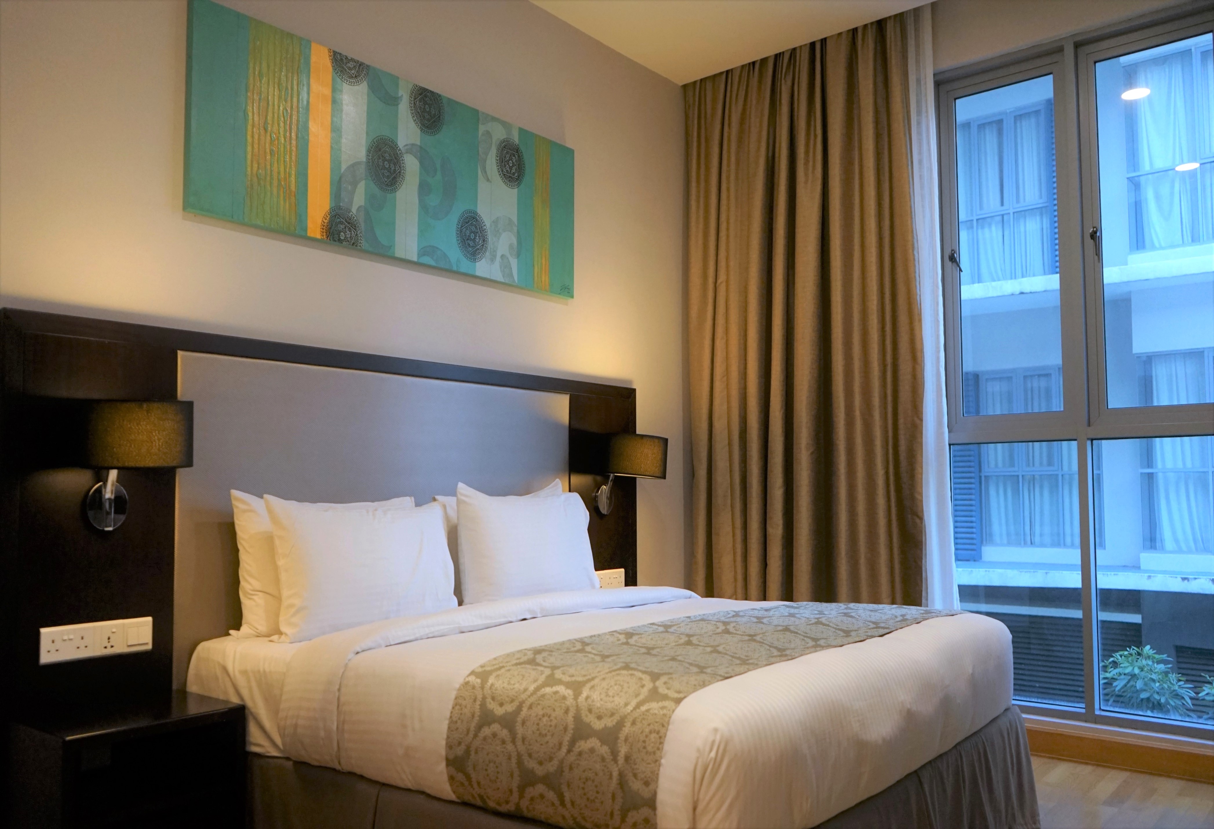 Guest room at the Trinidad Suites Johor, Trademark Collection by Wyndham in Iskandar Puteri, Other than US/Canada