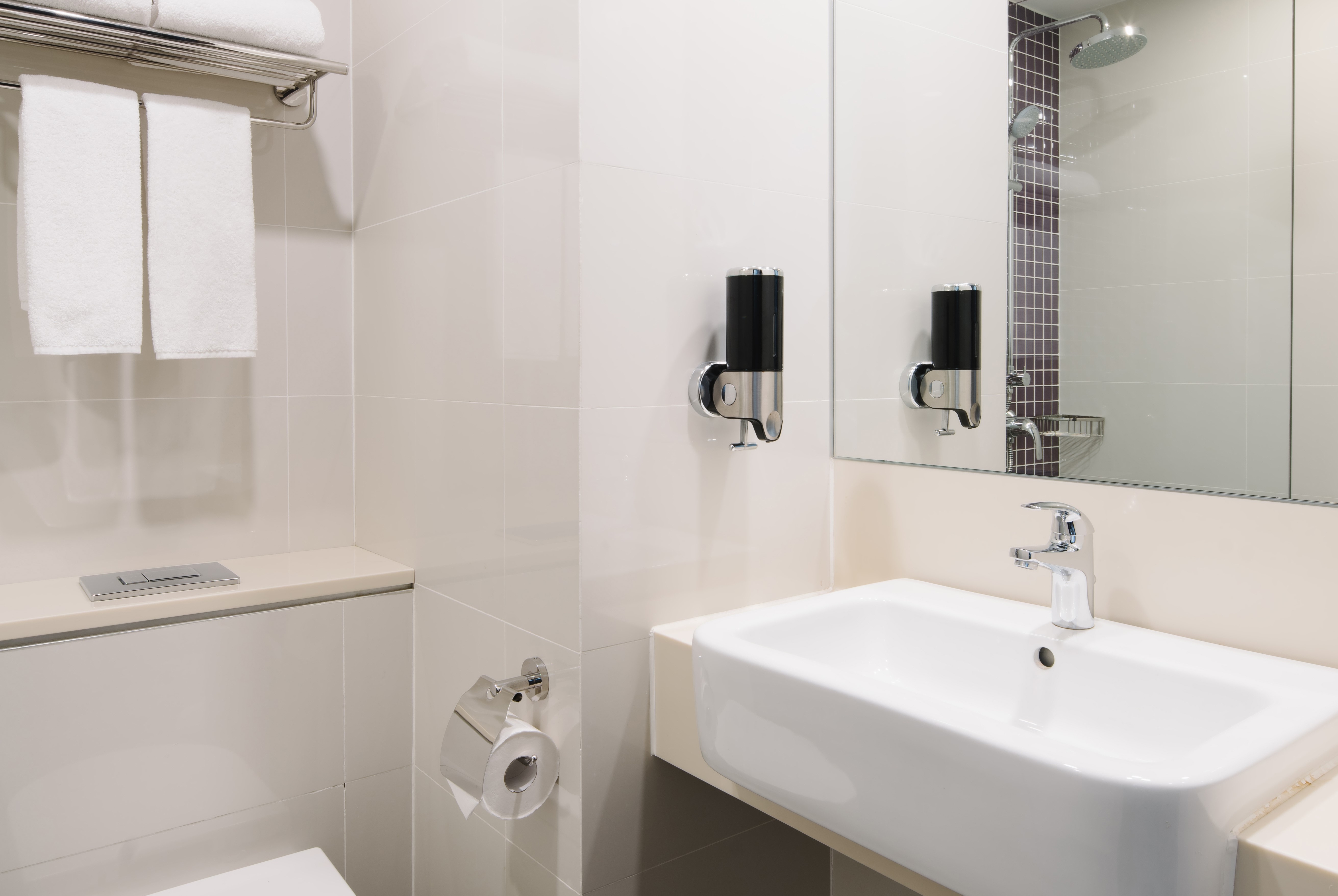 Guest room bath at the Hotel Traveltine Downtown Singapore, Trademark Collection in Singapore, Other than US/Canada