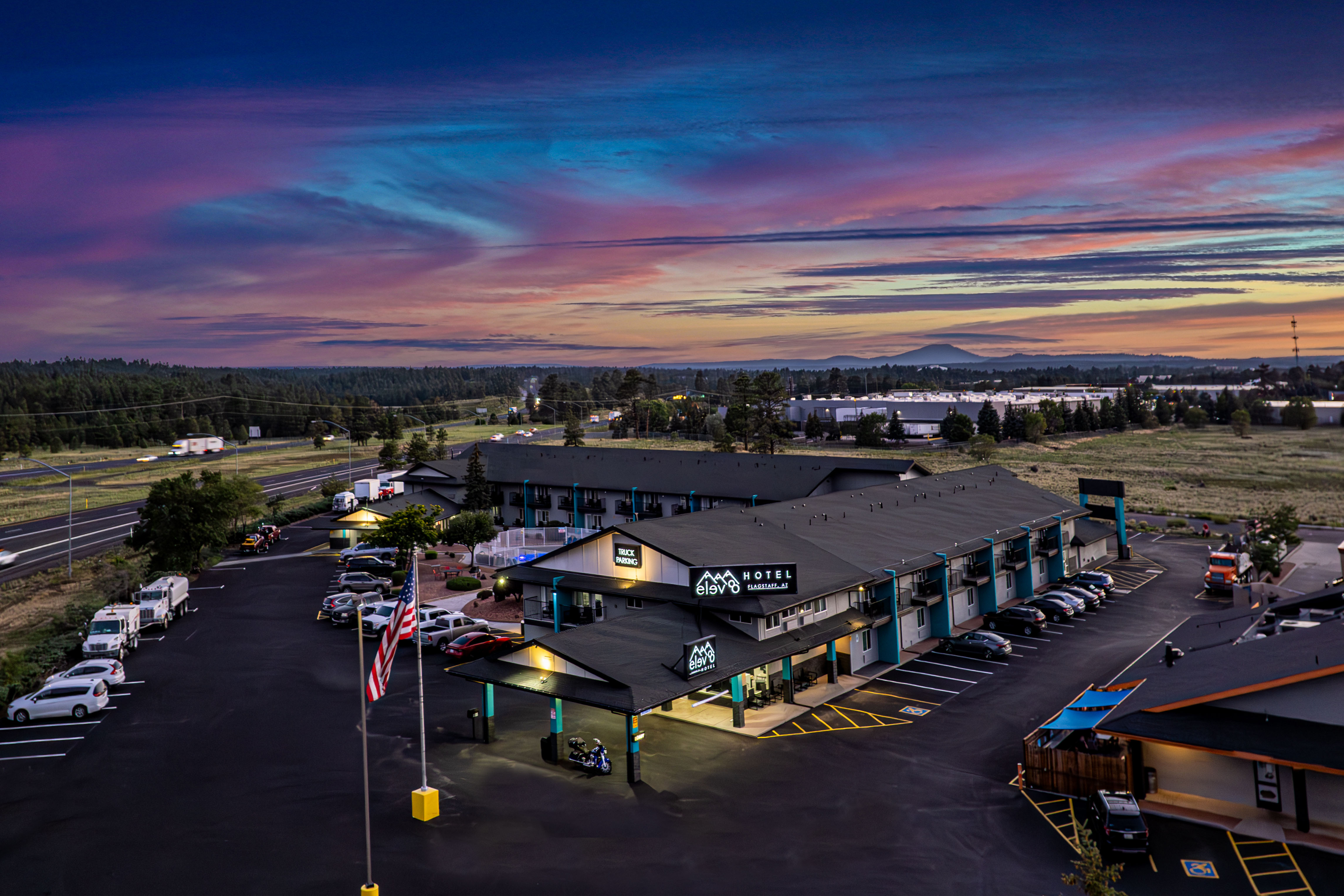 Exterior Night Image of Hotel Elev8 Flagstaff, Trademark Collection by Wyndham hotel in Flagstaff, Arizona