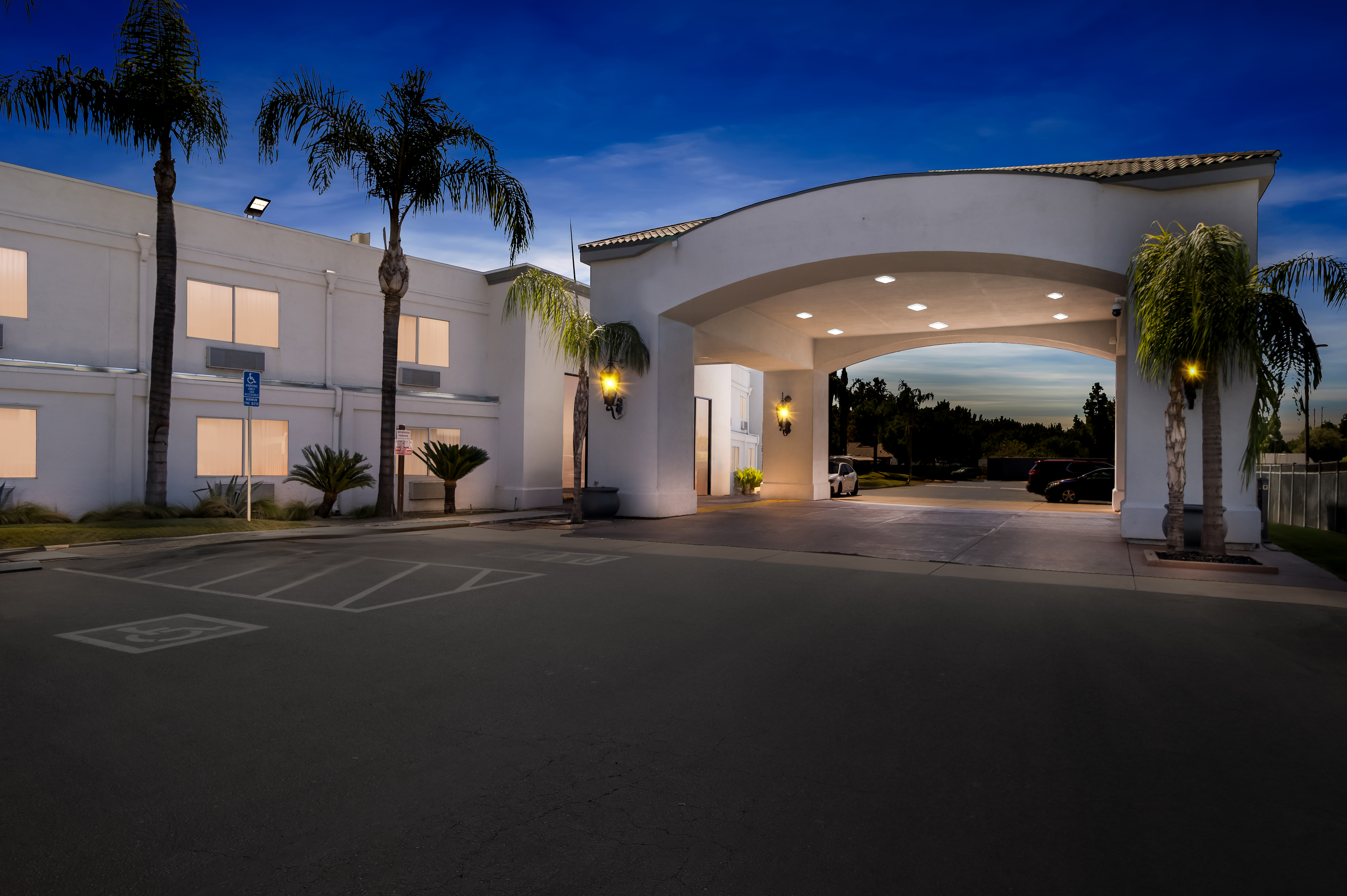 Exterior Night Image of Hourglass Hotel, Trademark Collection by Wyndham hotel in Bakersfield, California