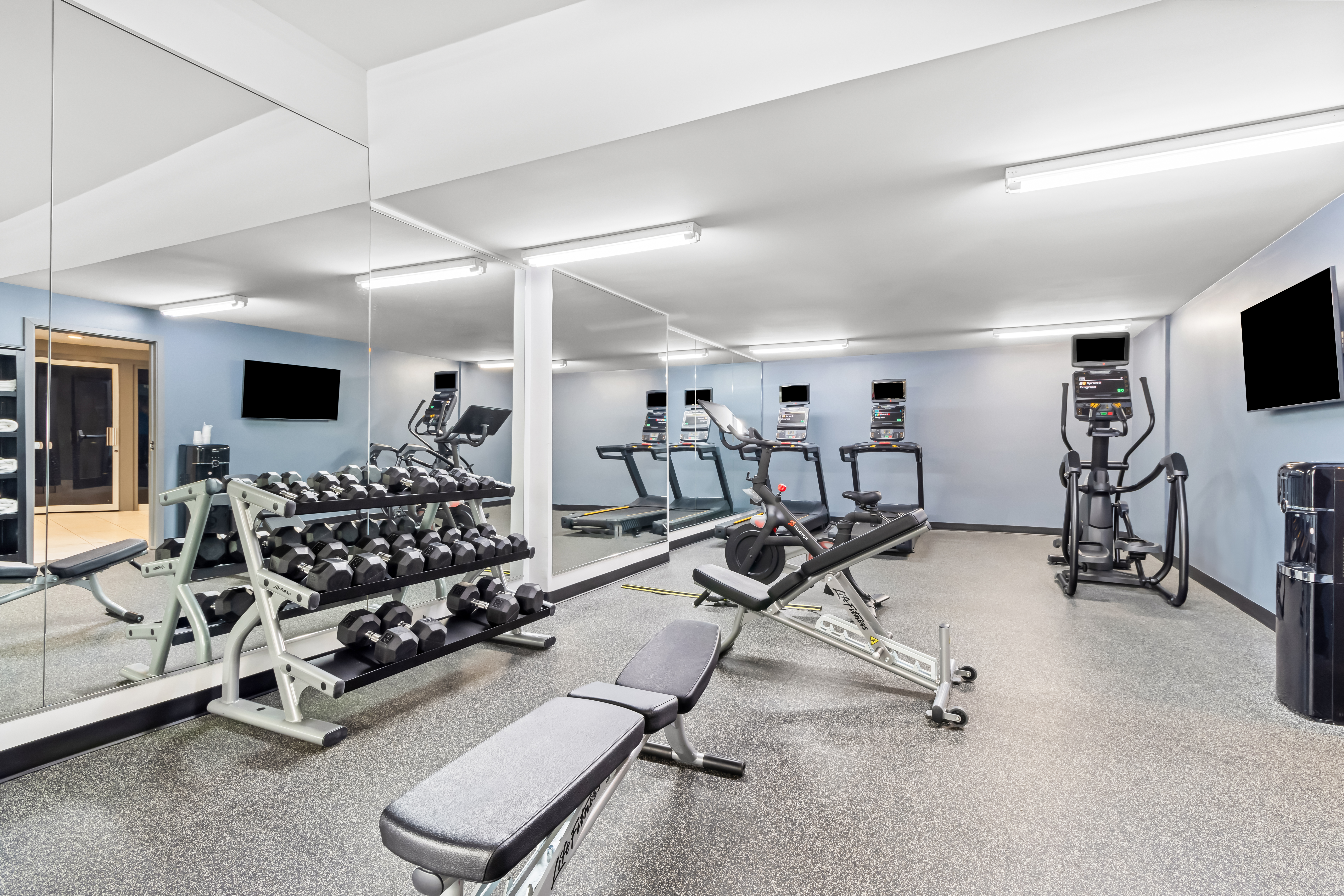 Fitness room at Hourglass Hotel, Trademark Collection by Wyndham in Bakersfield, California