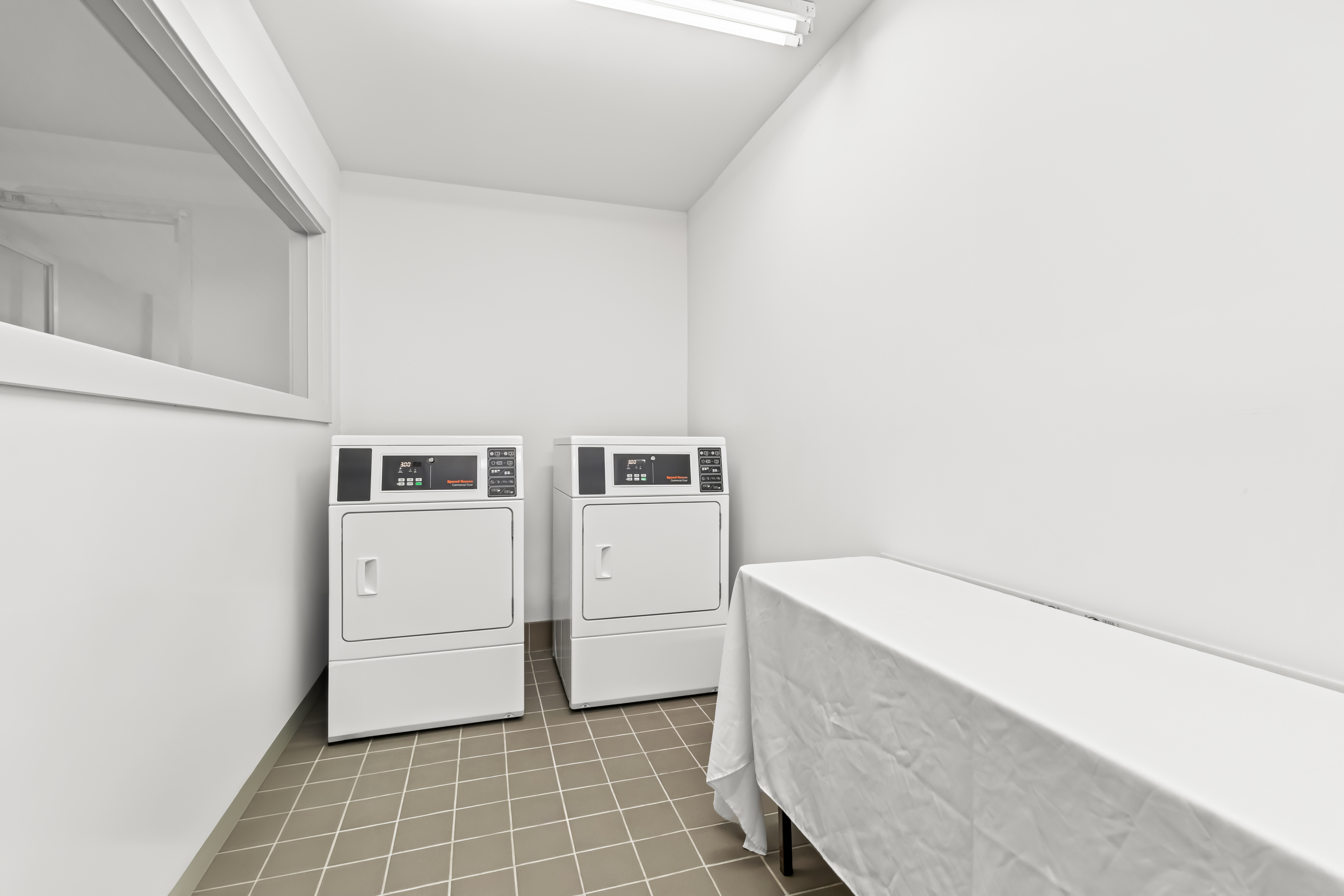 Laundry facilities at Hourglass Hotel, Trademark Collection by Wyndham in Bakersfield, California