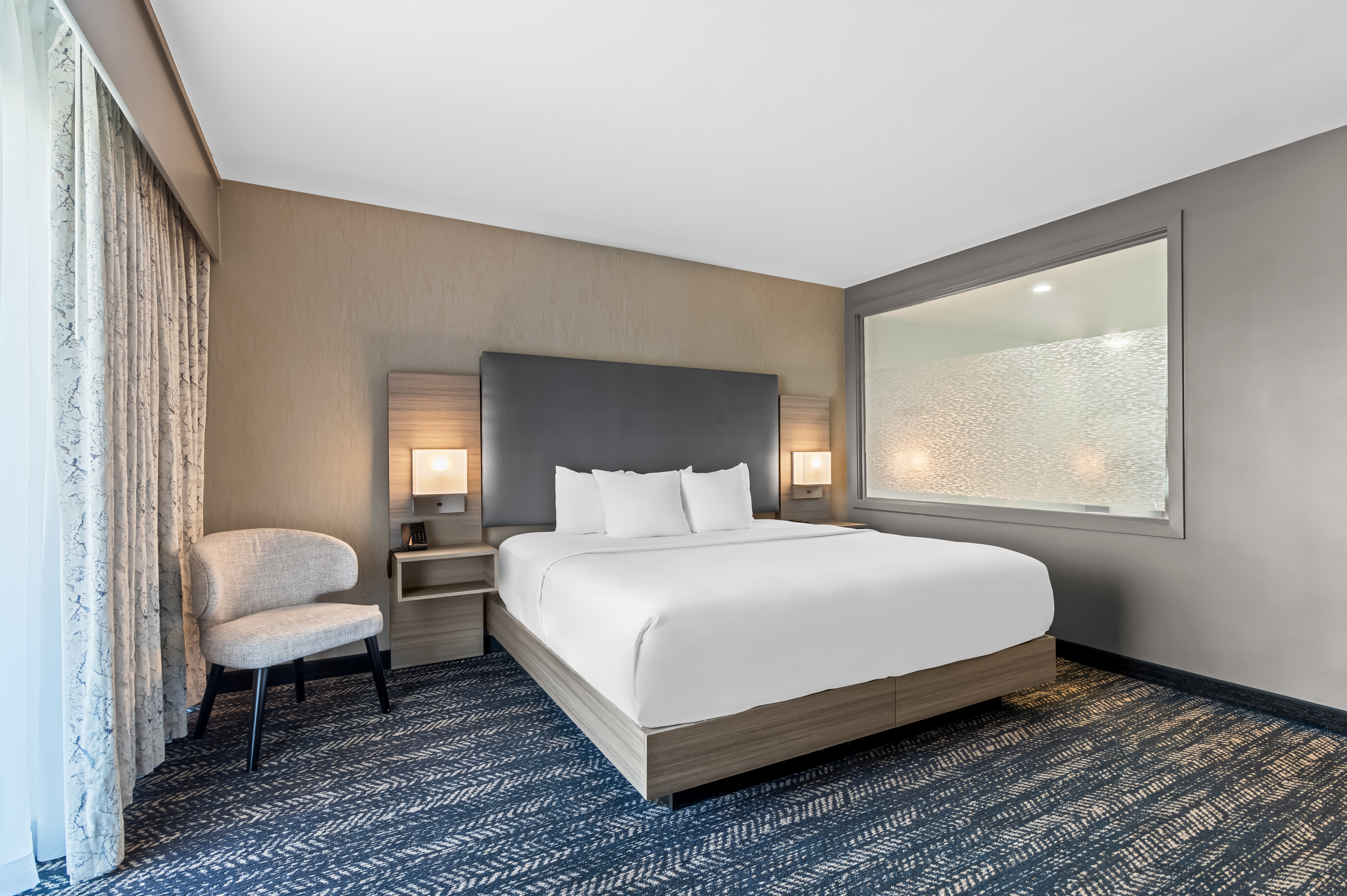 Guest room at the Hourglass Hotel, Trademark Collection by Wyndham in Bakersfield, California