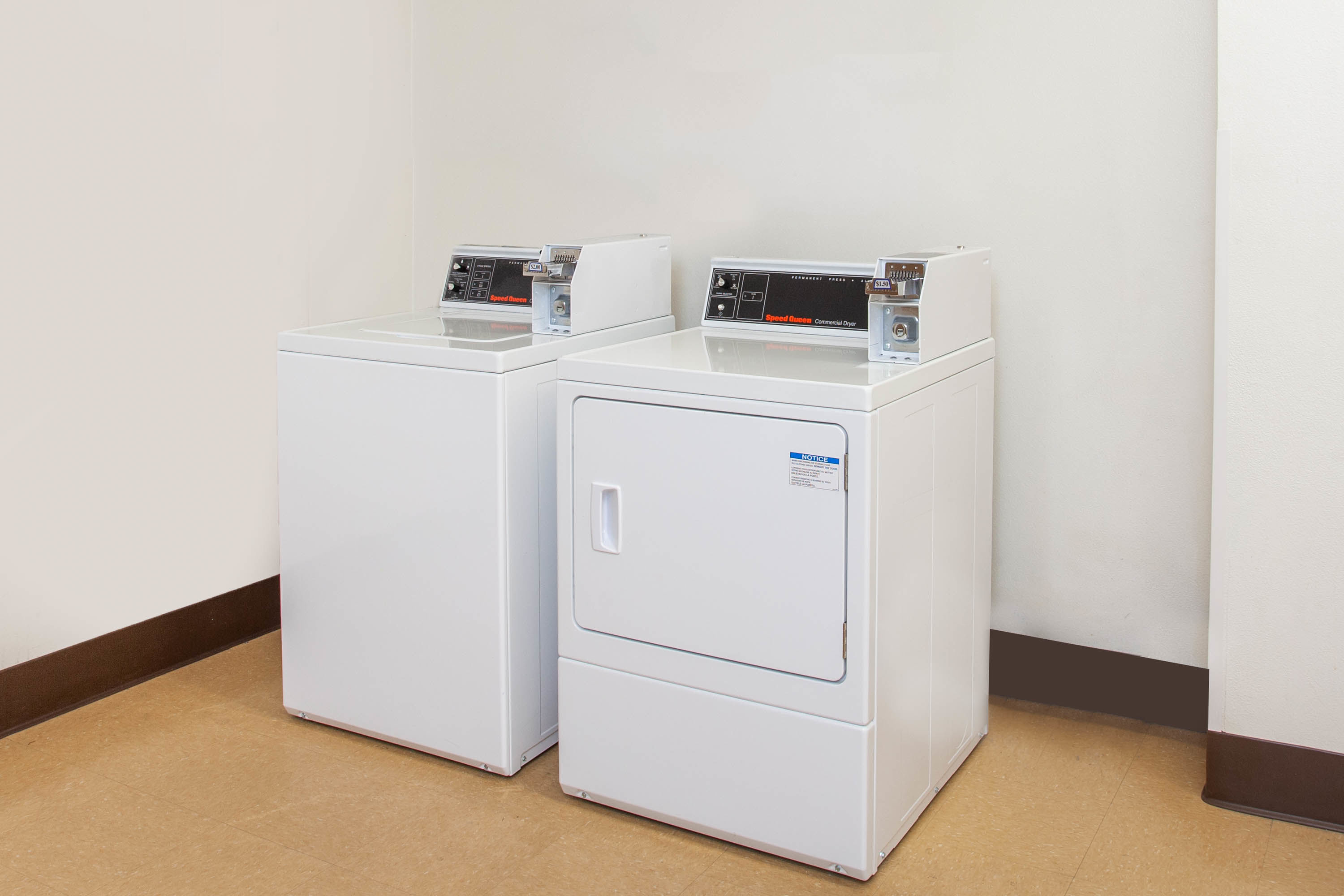 Laundry facilities at Azure Hotel & Suites, Trademark Collection by Wyndham in Ontario, California