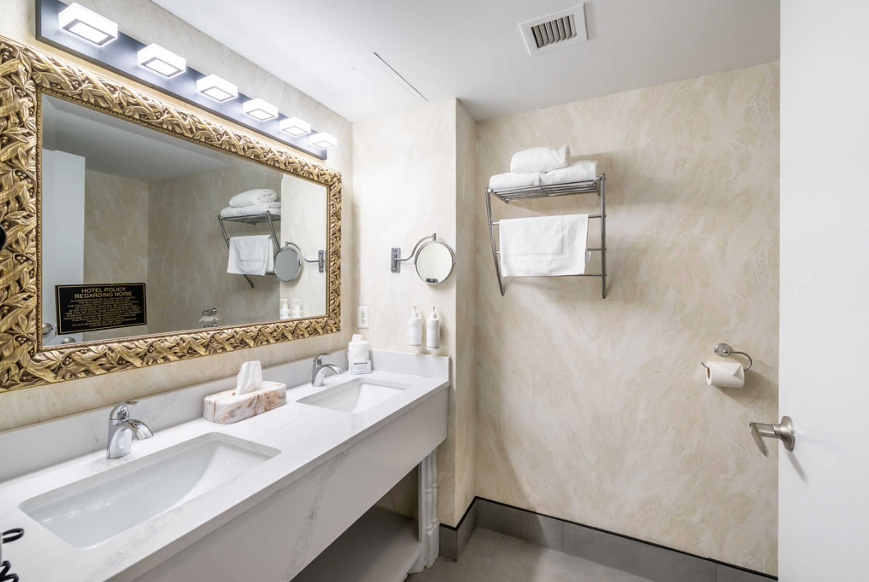 King bed guest room at the Bellissimo Hotel, Trademark by Wyndham Near Foxwoods Casino in North Stonington, Connecticut