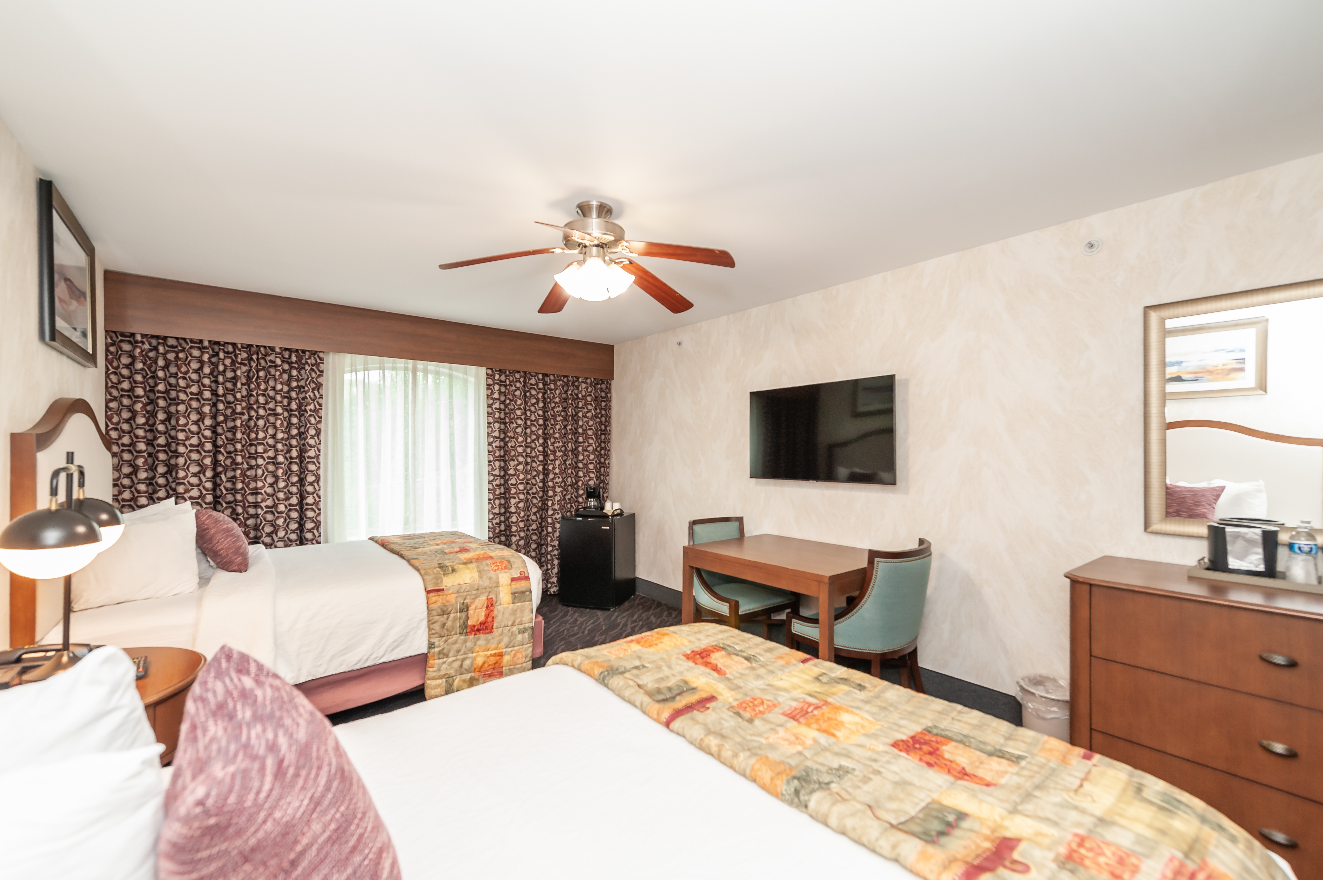 Guest room at the Bellissimo Hotel, Trademark by Wyndham Near Foxwoods Casino in North Stonington, Connecticut