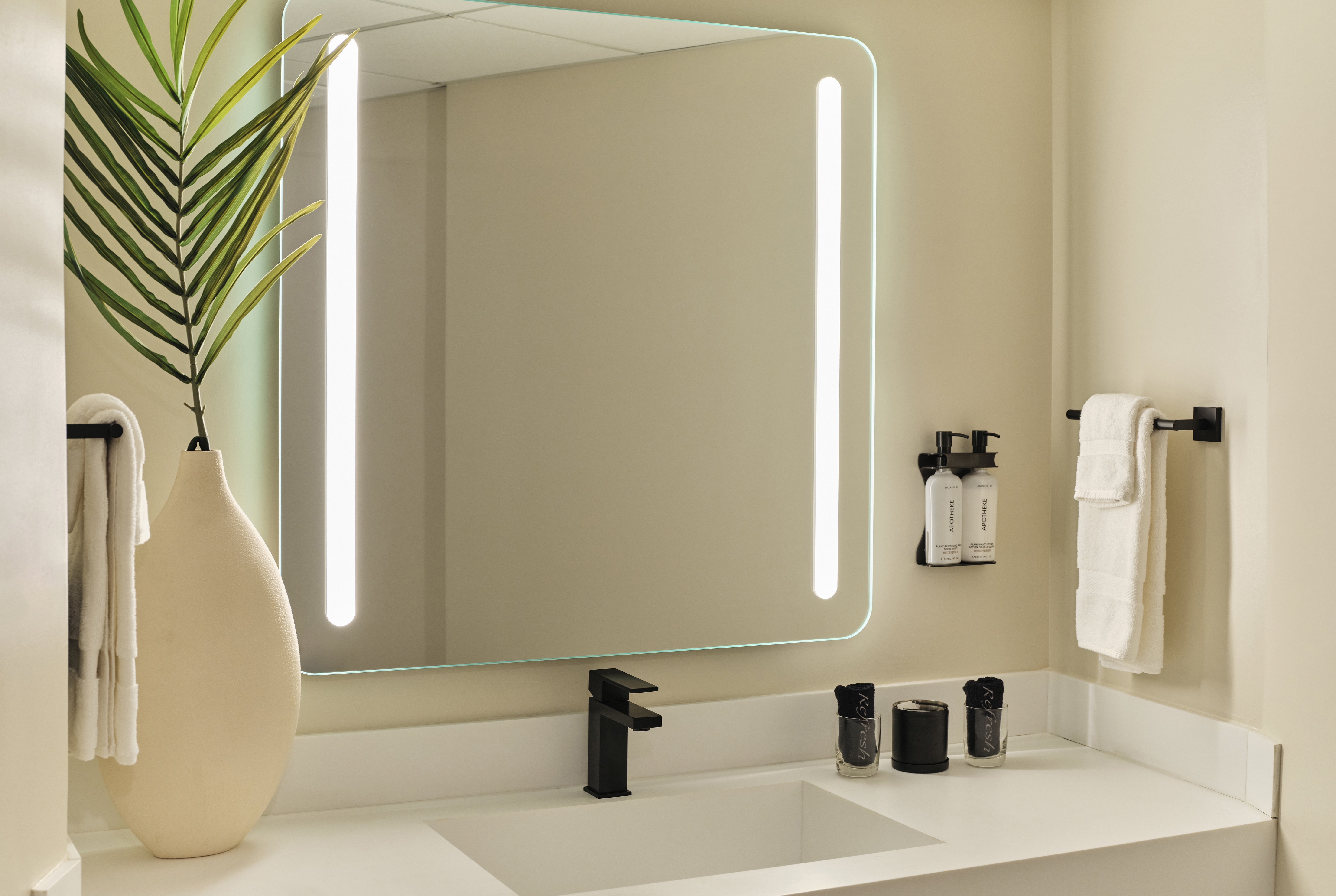 Guest room bath at the Ambros Daytona, Trademark Collection by Wyndham in Daytona Beach, Florida