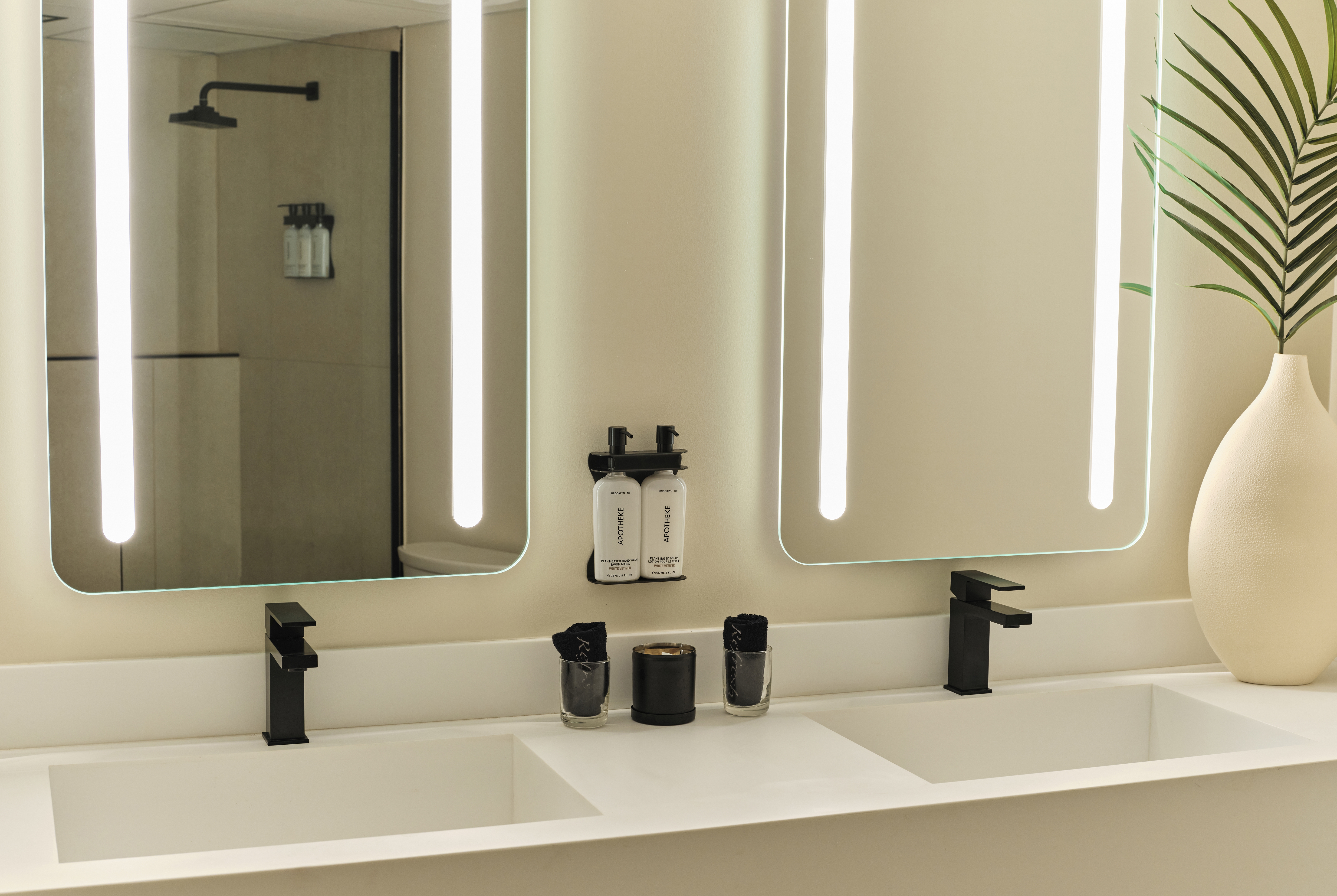 Guest room bath at the Ambros Daytona, Trademark Collection by Wyndham in Daytona Beach, Florida