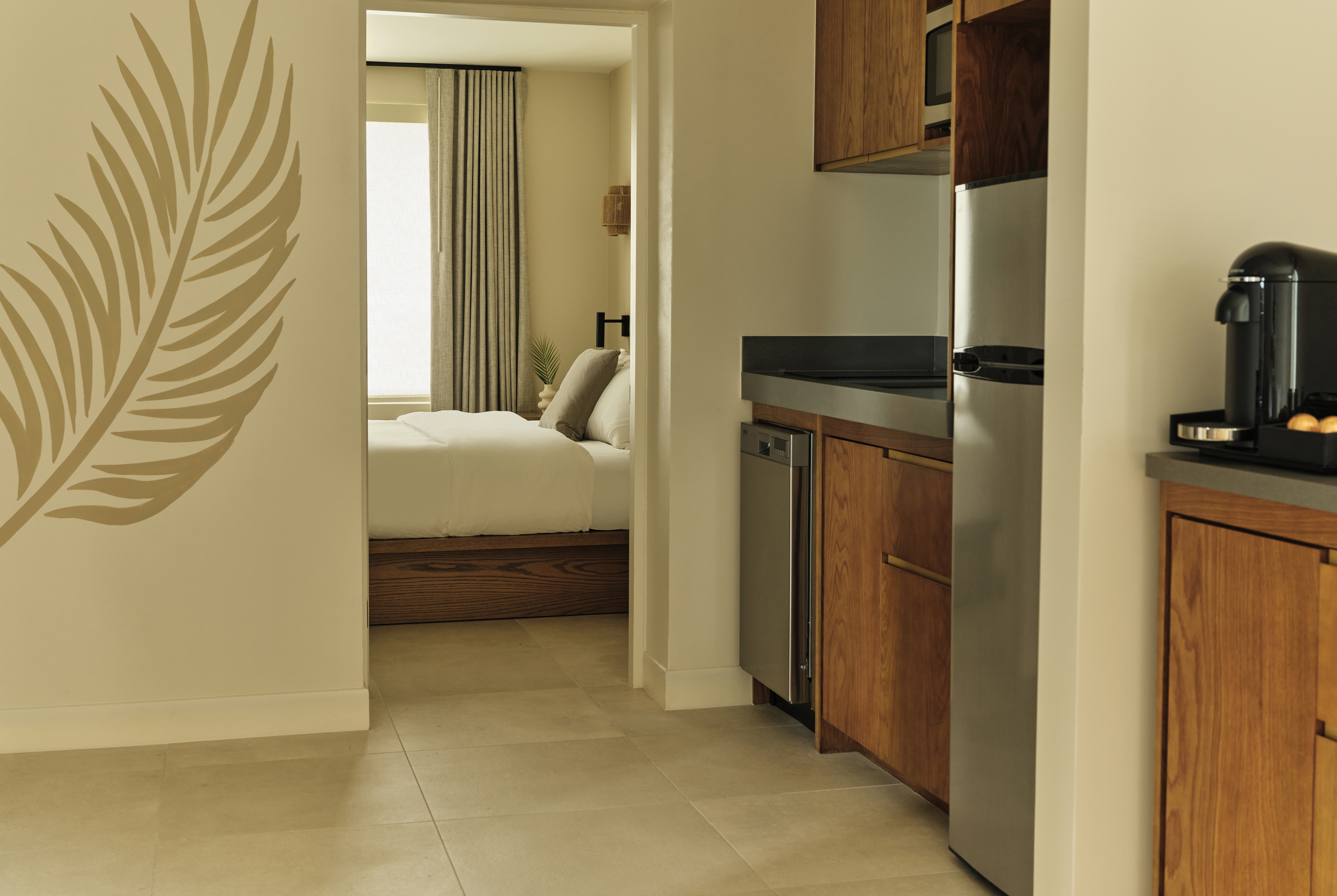 Guest room at the Ambros Daytona, Trademark Collection by Wyndham in Daytona Beach, Florida