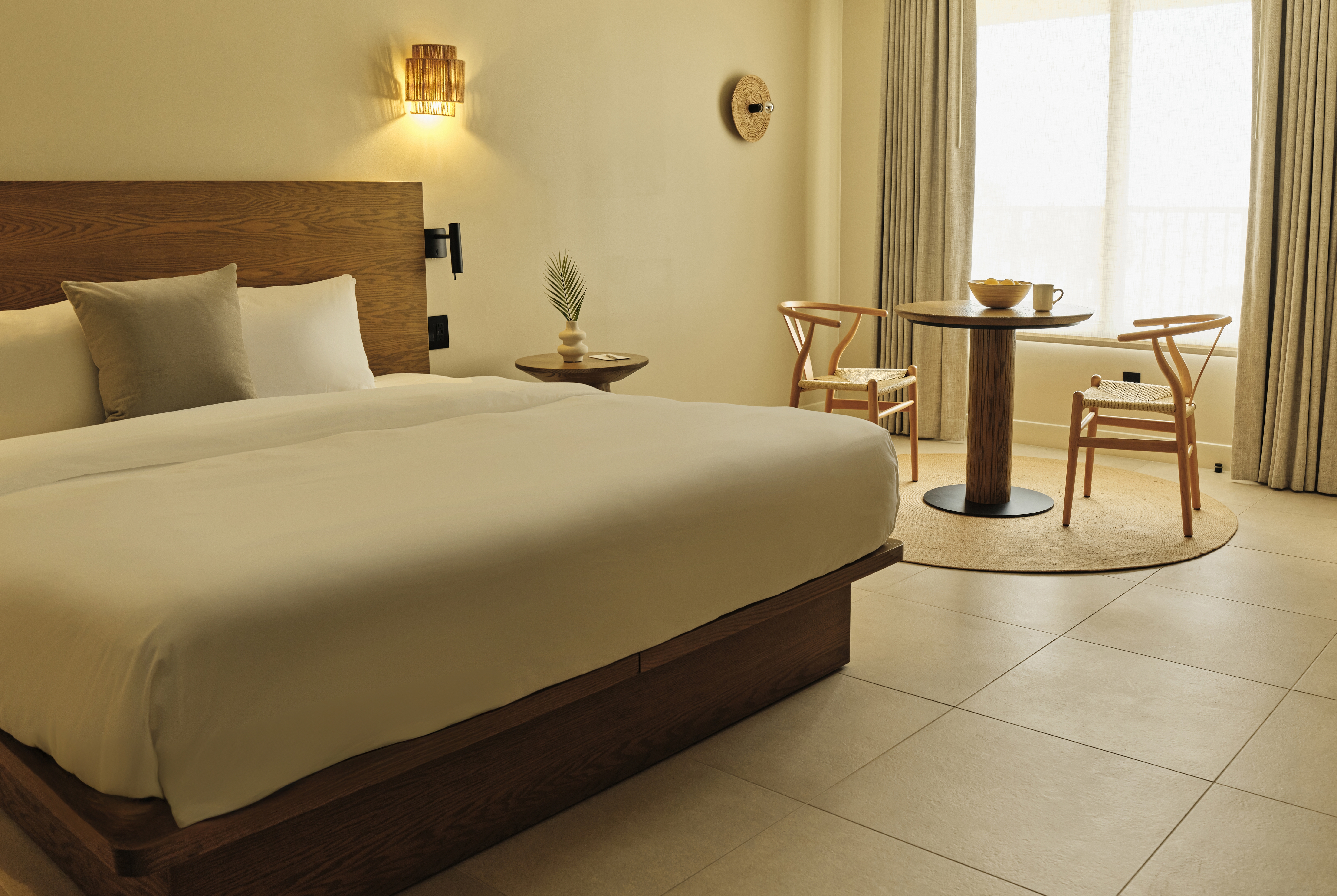 Guest room at the Ambros Daytona, Trademark Collection by Wyndham in Daytona Beach, Florida