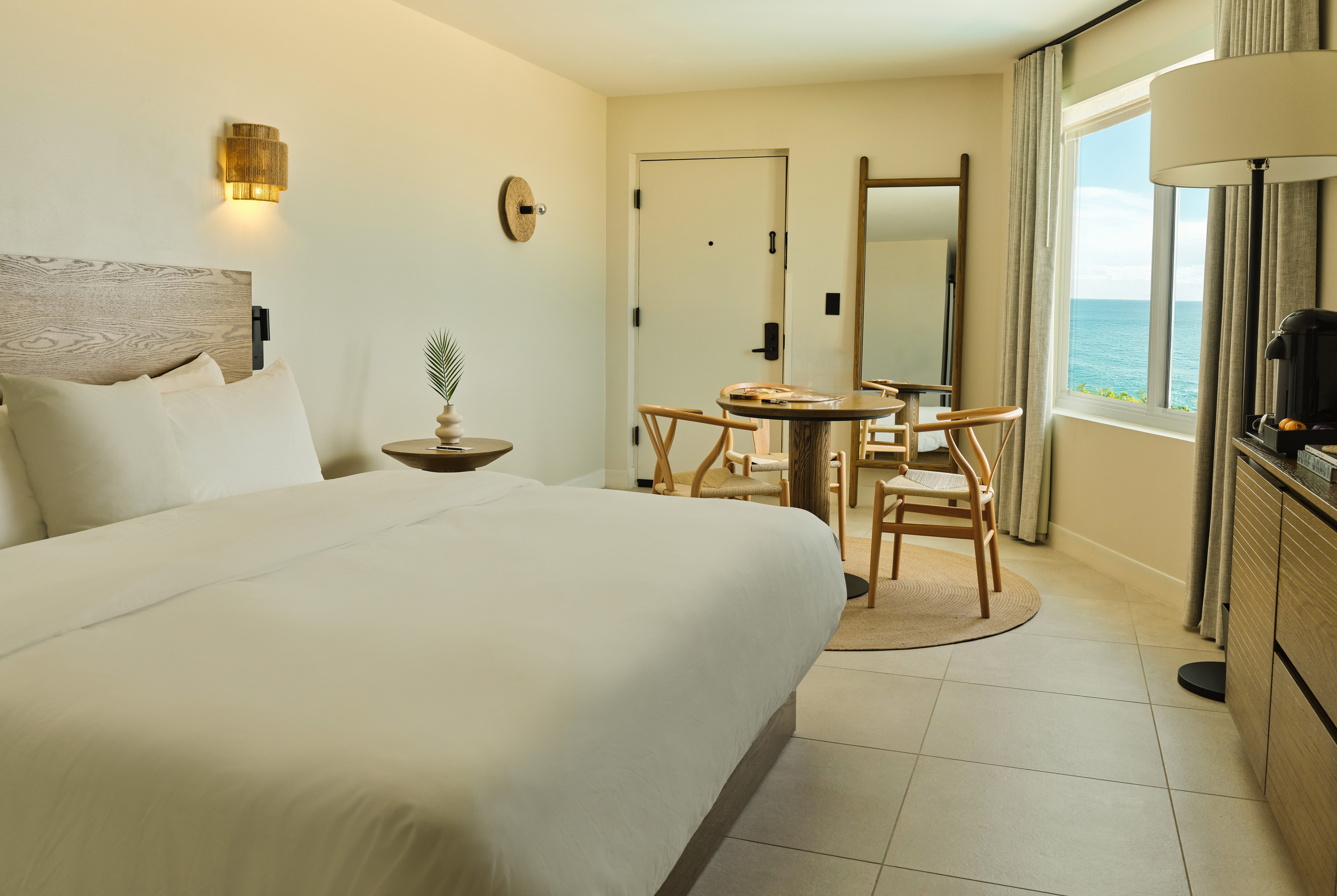 Guest room at the Ambros Daytona, Trademark Collection by Wyndham in Daytona Beach, Florida