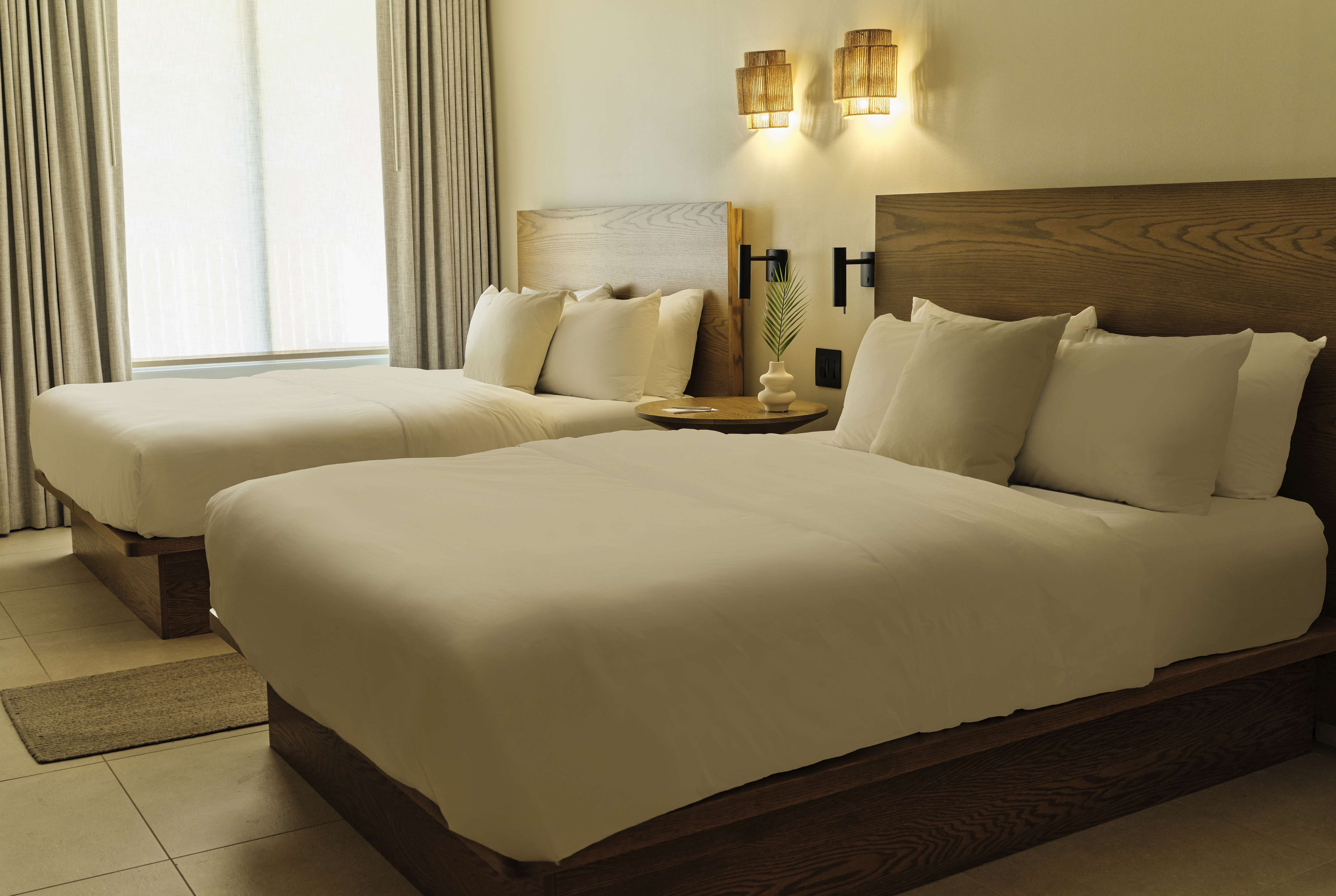 Guest room at the Ambros Daytona, Trademark Collection by Wyndham in Daytona Beach, Florida