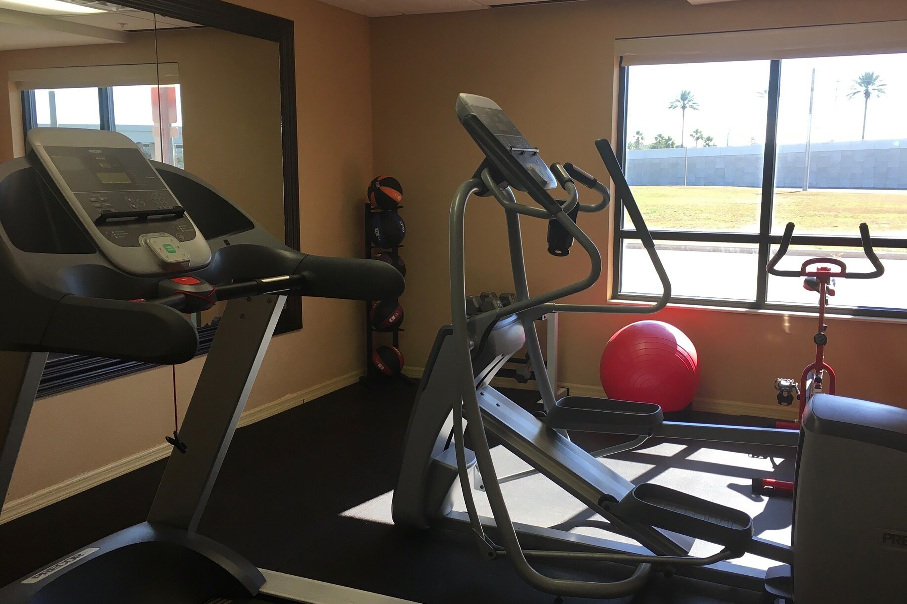 Fitness room at Marble Waters Hotel & Suites, Trademark by Wyndham in Jacksonville, Florida