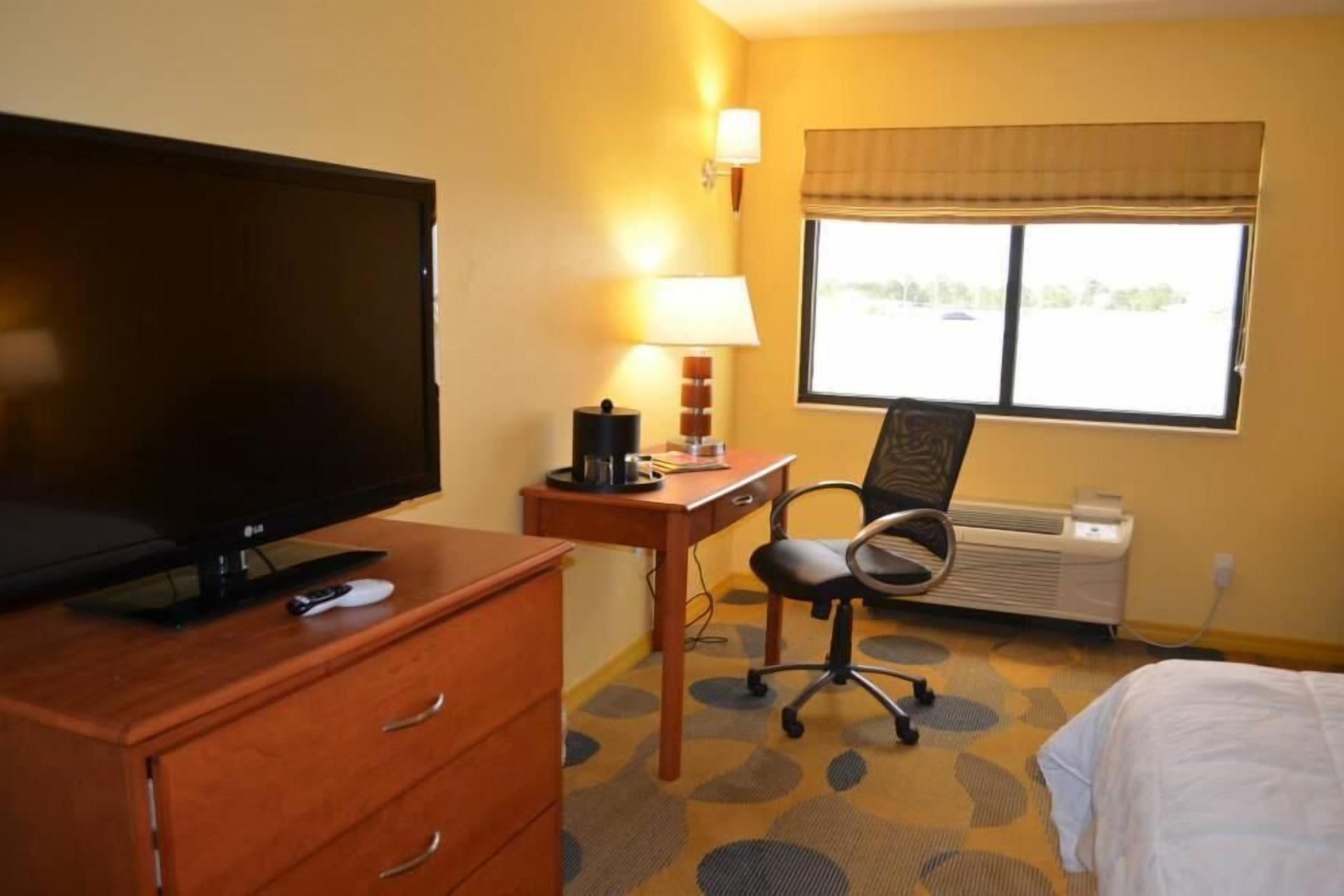 Guest room at the Marble Waters Hotel & Suites, Trademark by Wyndham in Jacksonville, Florida