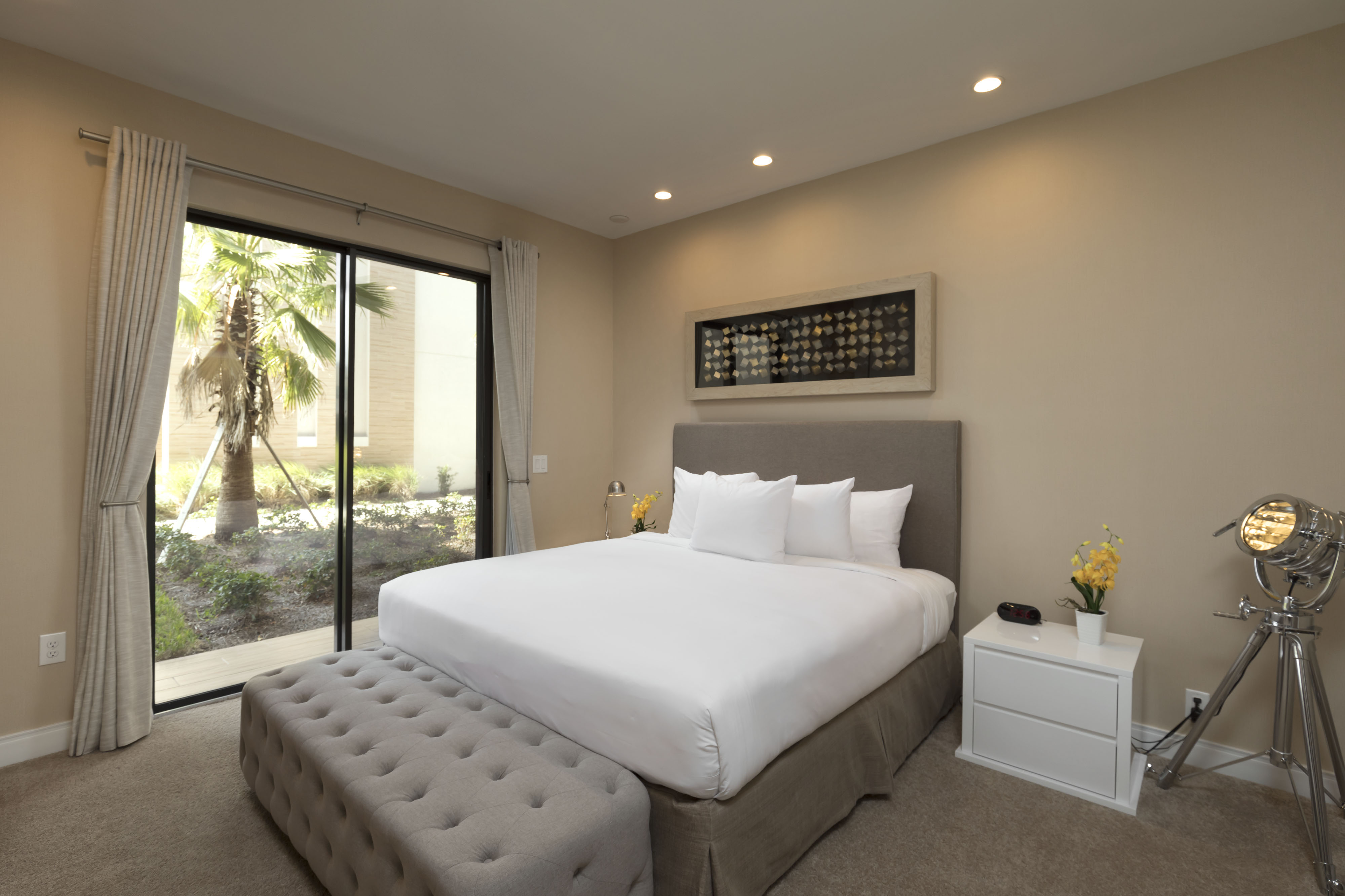 Guest room at the Magic Village Views Trademark Collection by Wyndham in Kissimmee, Florida
